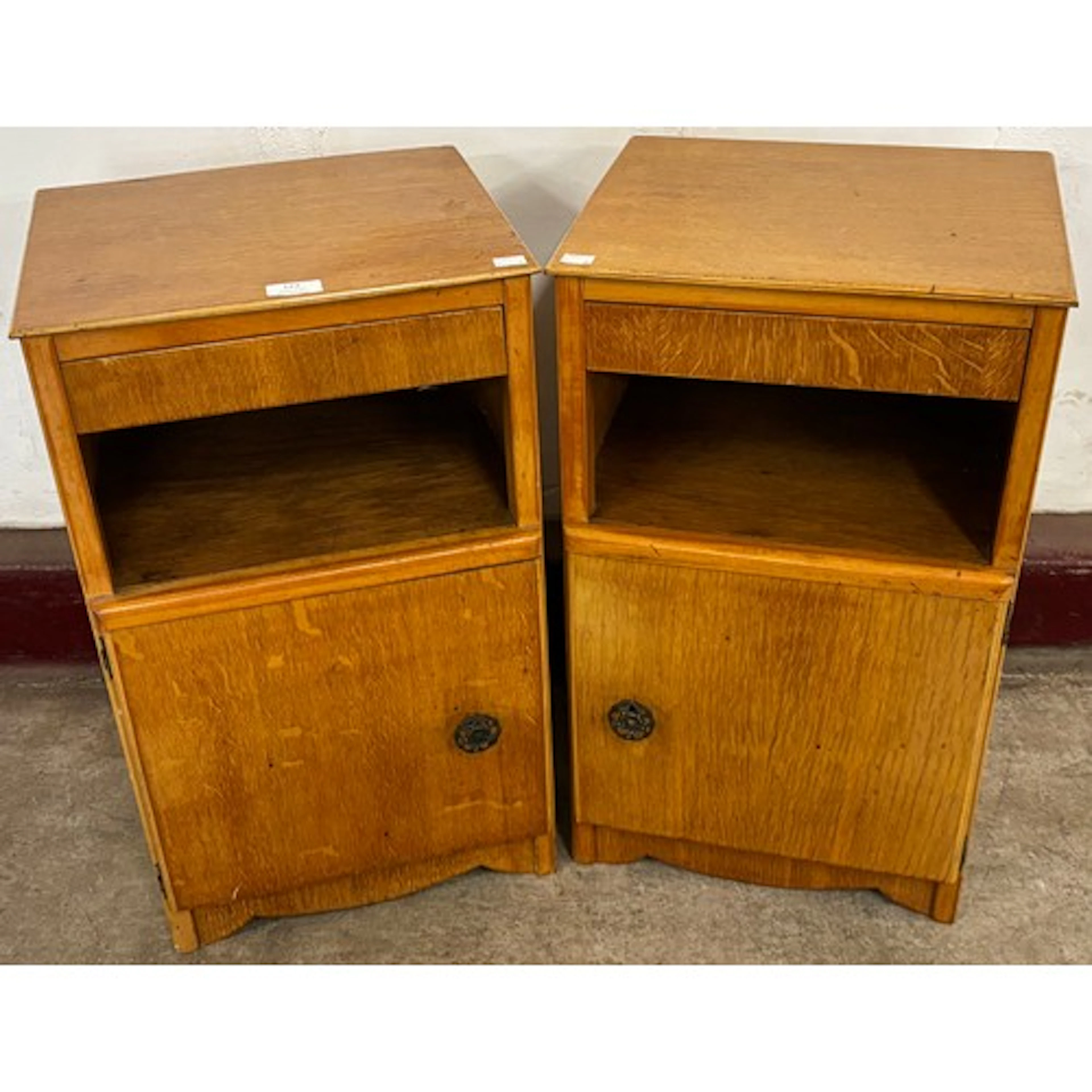 A pair of Art Deco oak bedside cabinets
