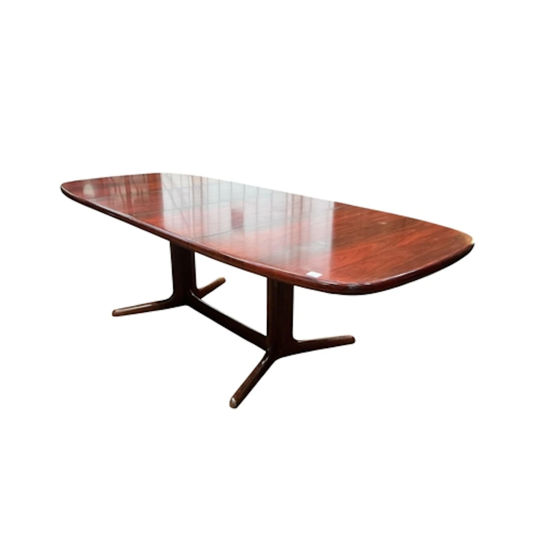 A Rasmus rosewood extending dining table, 232cm extended, wi...