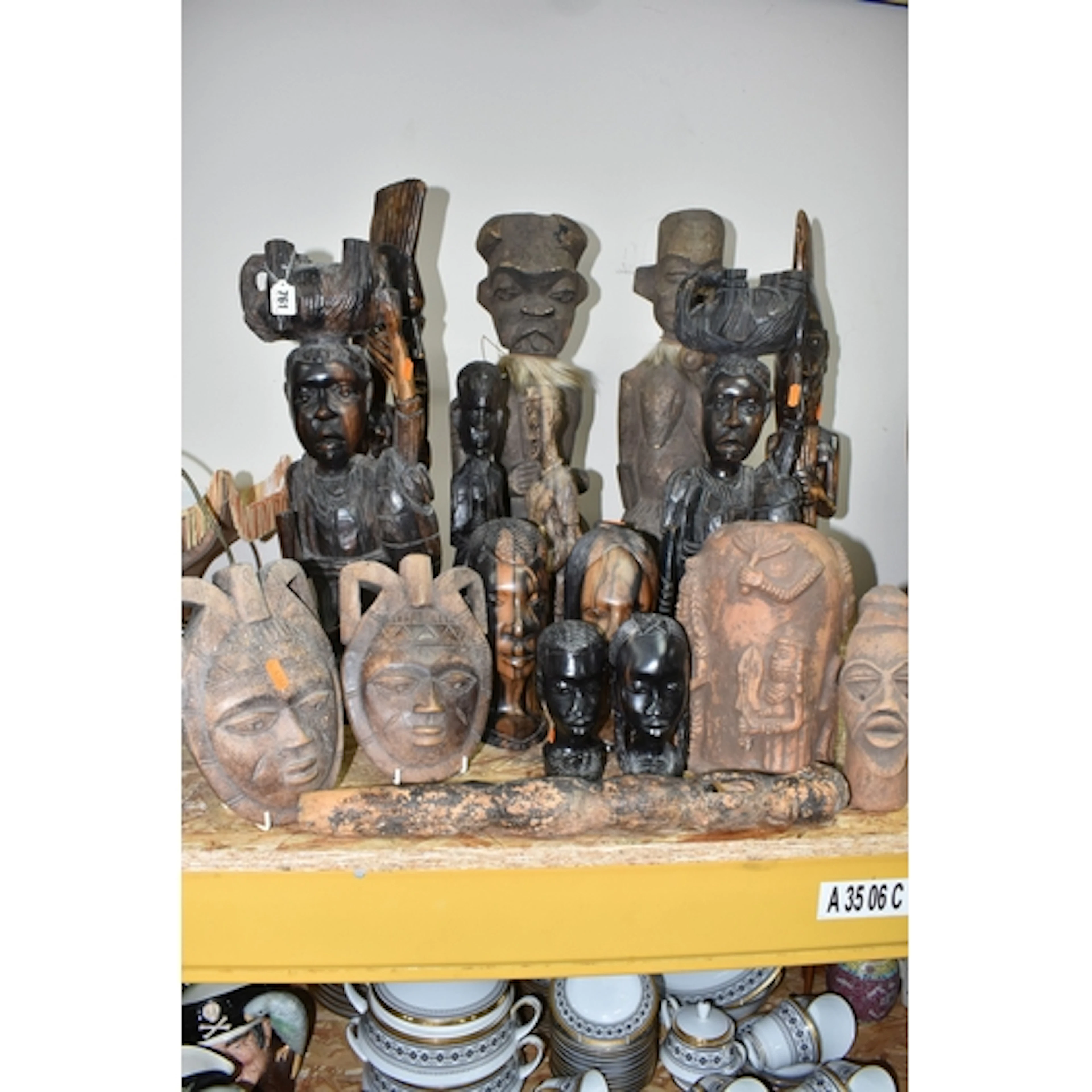 A COLLECTION OF MOSTLY WEST AFRICAN SCULPTURES to include a ...