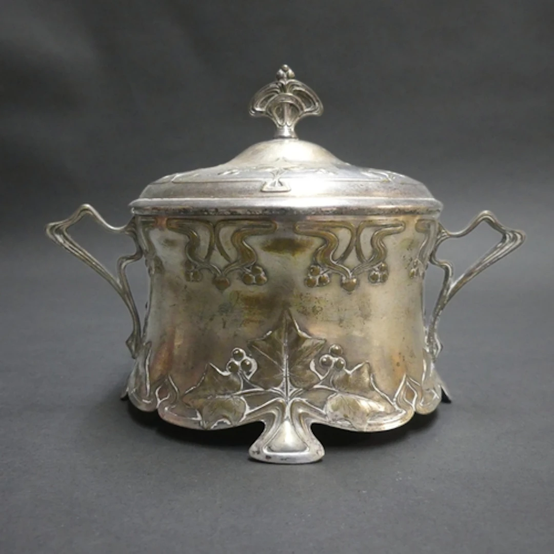 WMF - An Art Nouveau silver plated lidded and twin handled b...