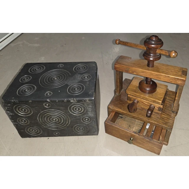 A Welsh skate carved folk art door stop with geometric circl...