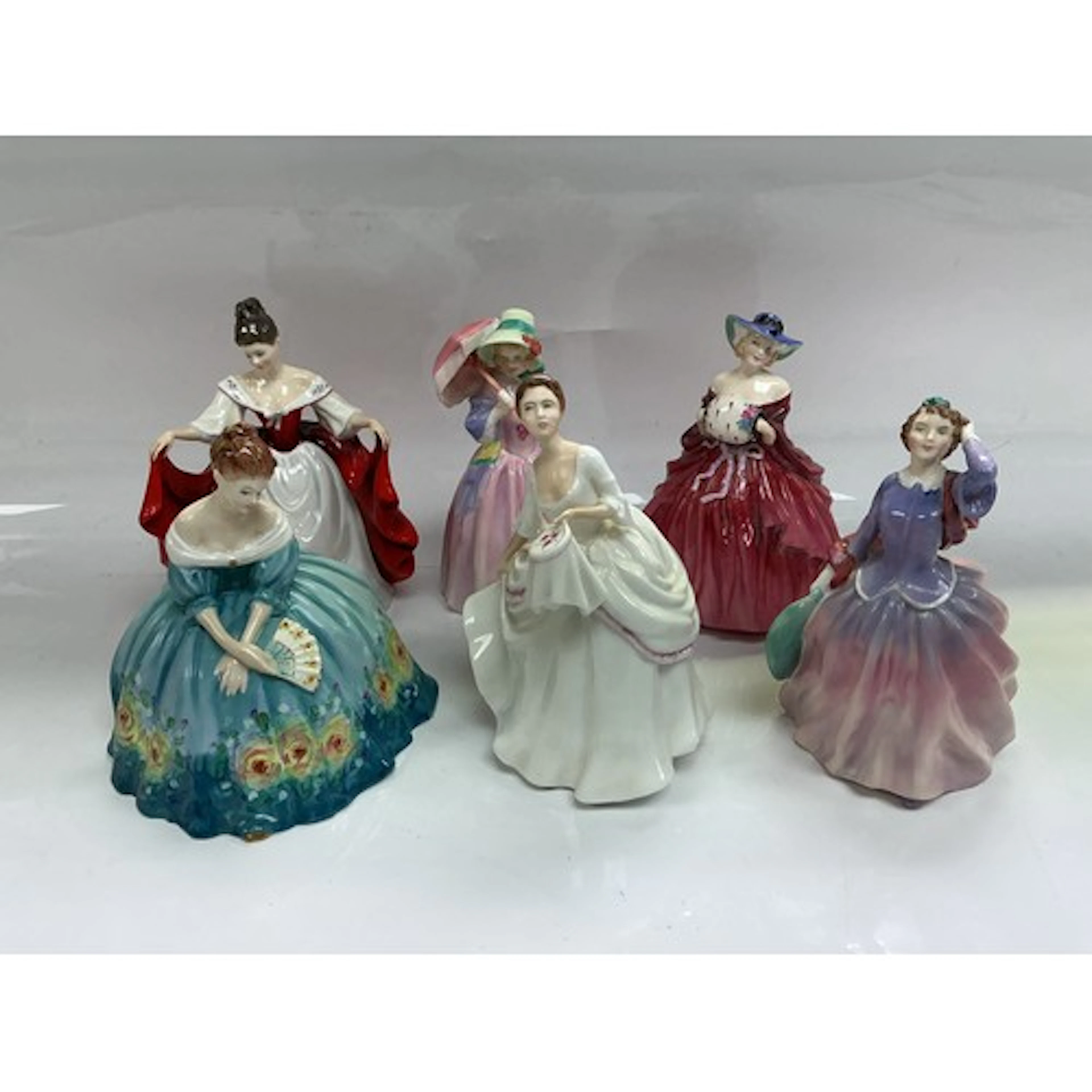 Six Royal Doulton figures comprising Blithe Morning, Genevie...
