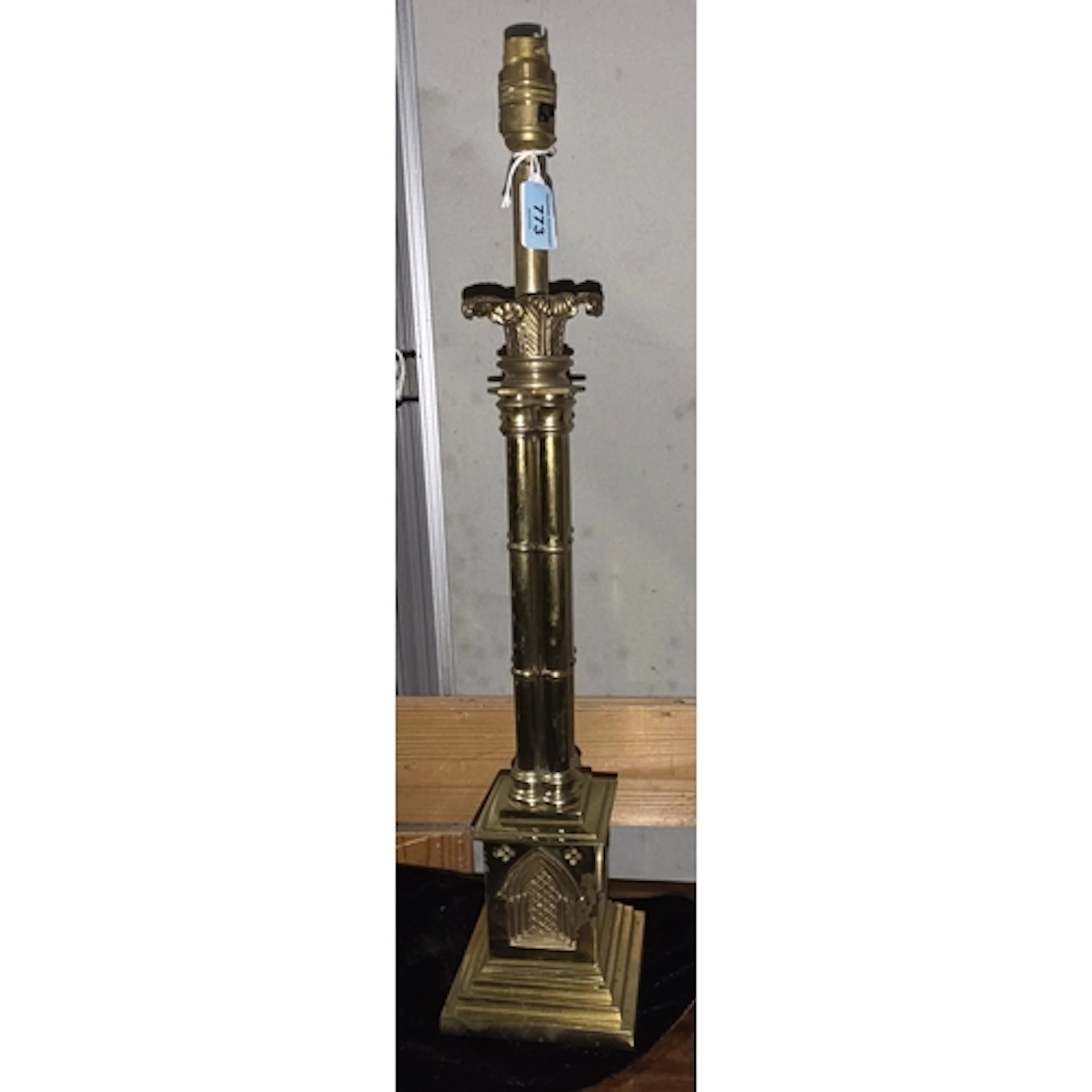 A VINTAGE LAMP BASE, brass Victorian Gothic style with clust...