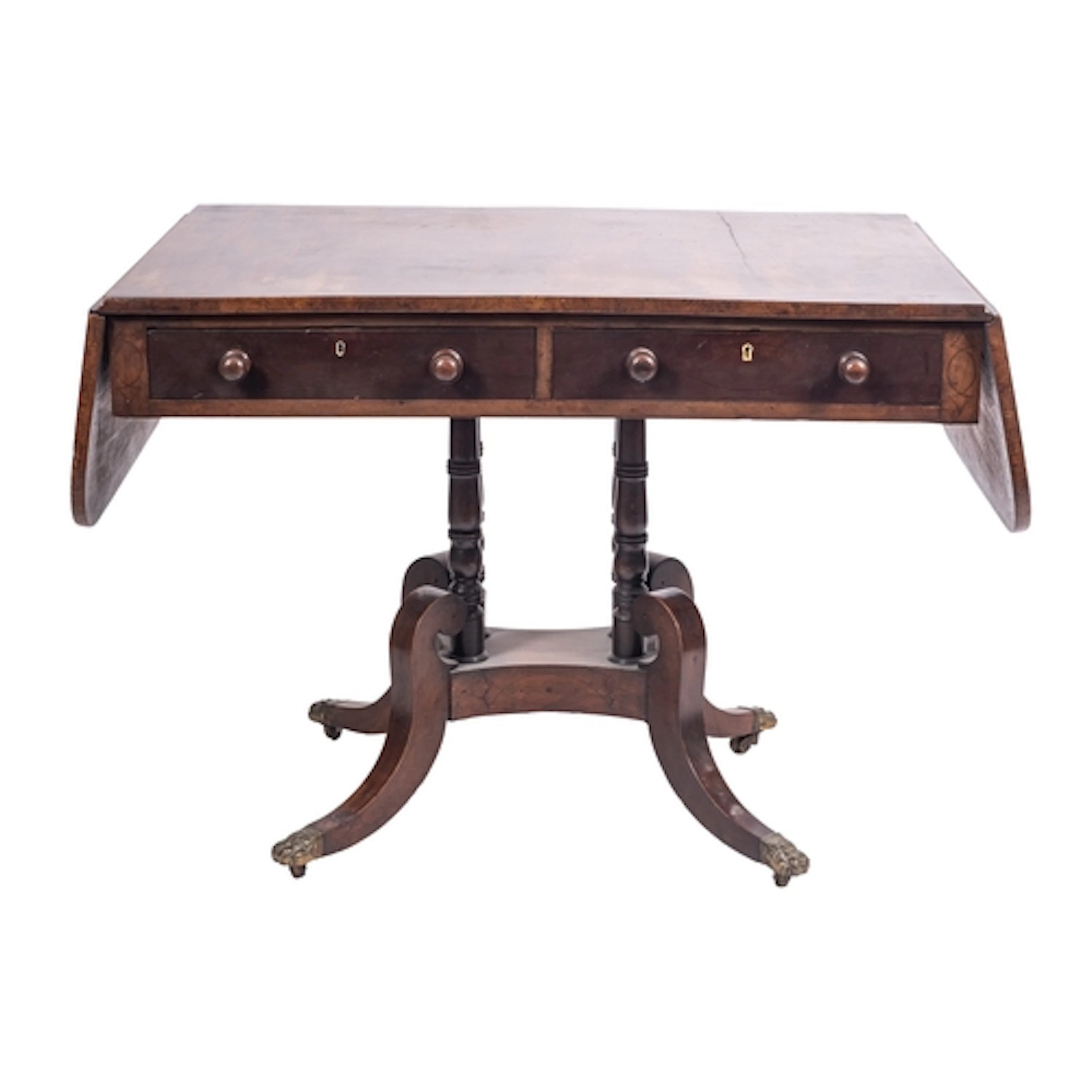 A George IV mahogany and crossbanded sofa table, circa 1825;...