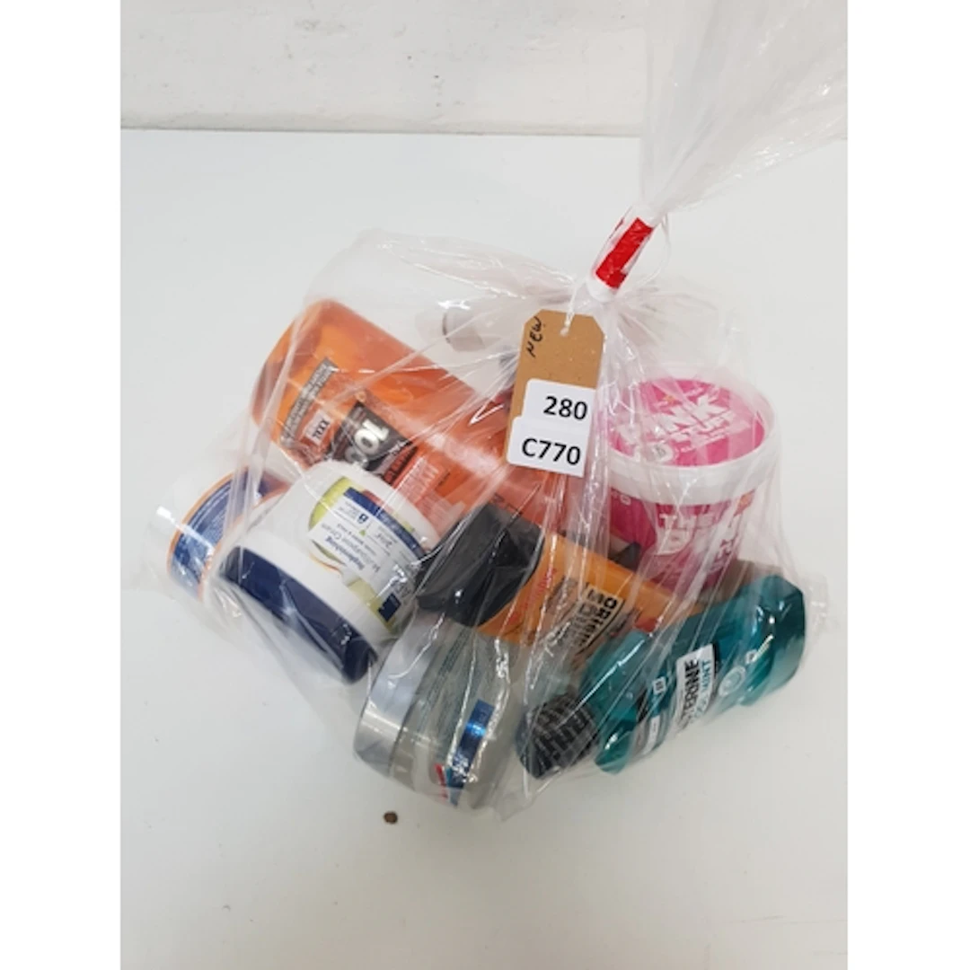 ONE BAG OF NEW AND USED COSMETICS Including Listerine, L'or...