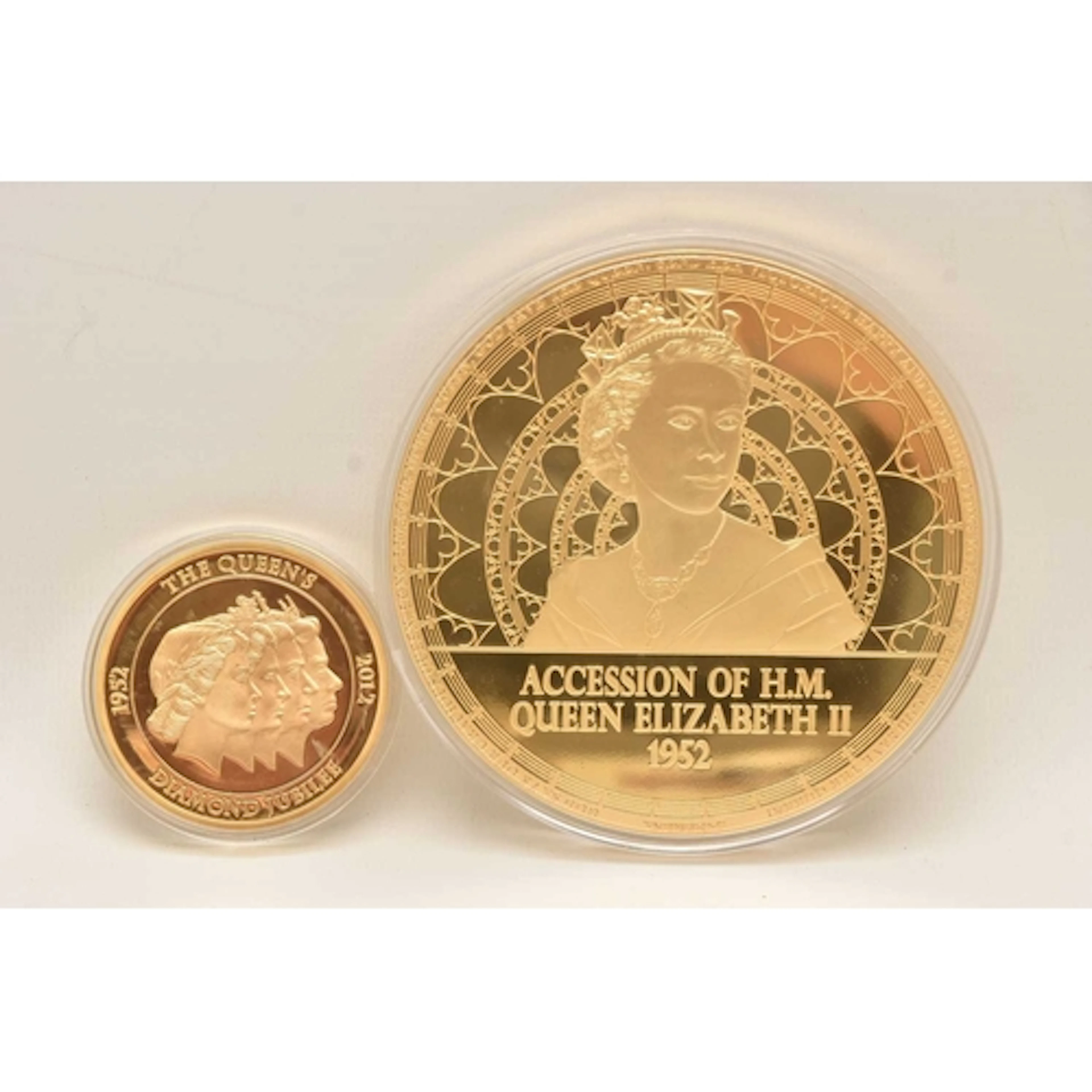 TWO QUEEN ELIZABETH II COMMEMORATIVE COINS, to include a lar...