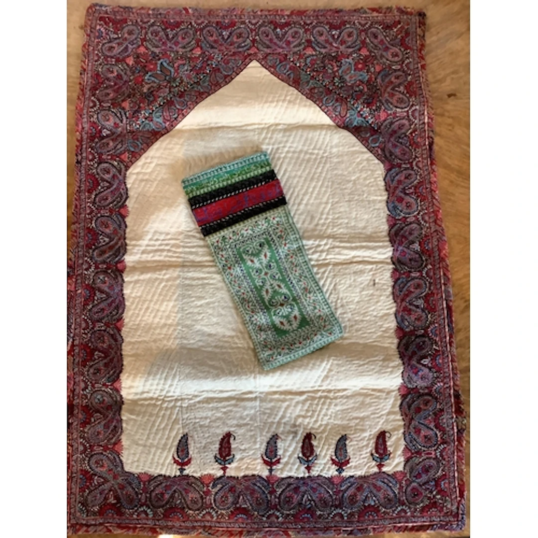 A 19th century Persian prayer mat and an Iranian Qajat dynas...