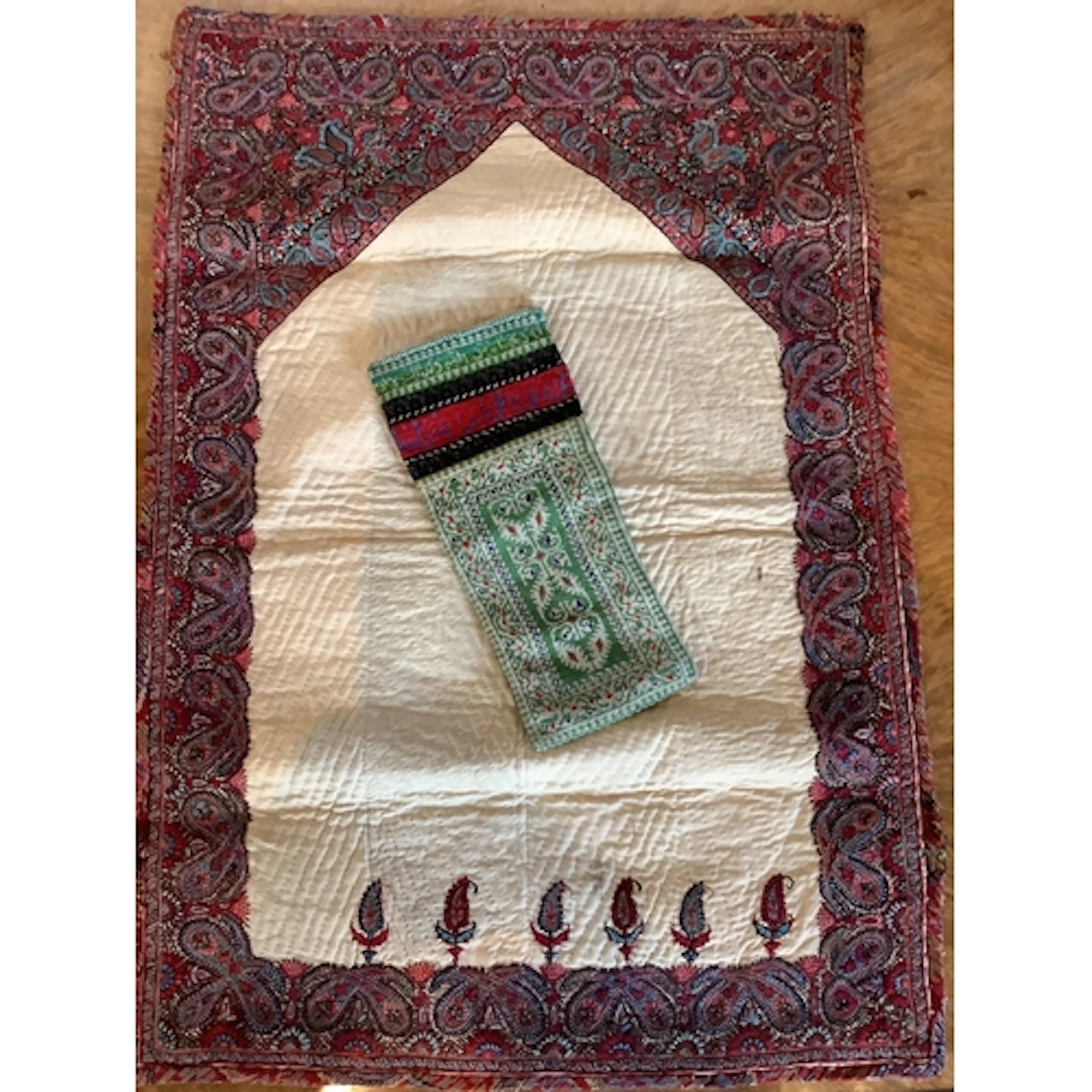 A 19th century Persian prayer mat and an Iranian Qajat dynas...
