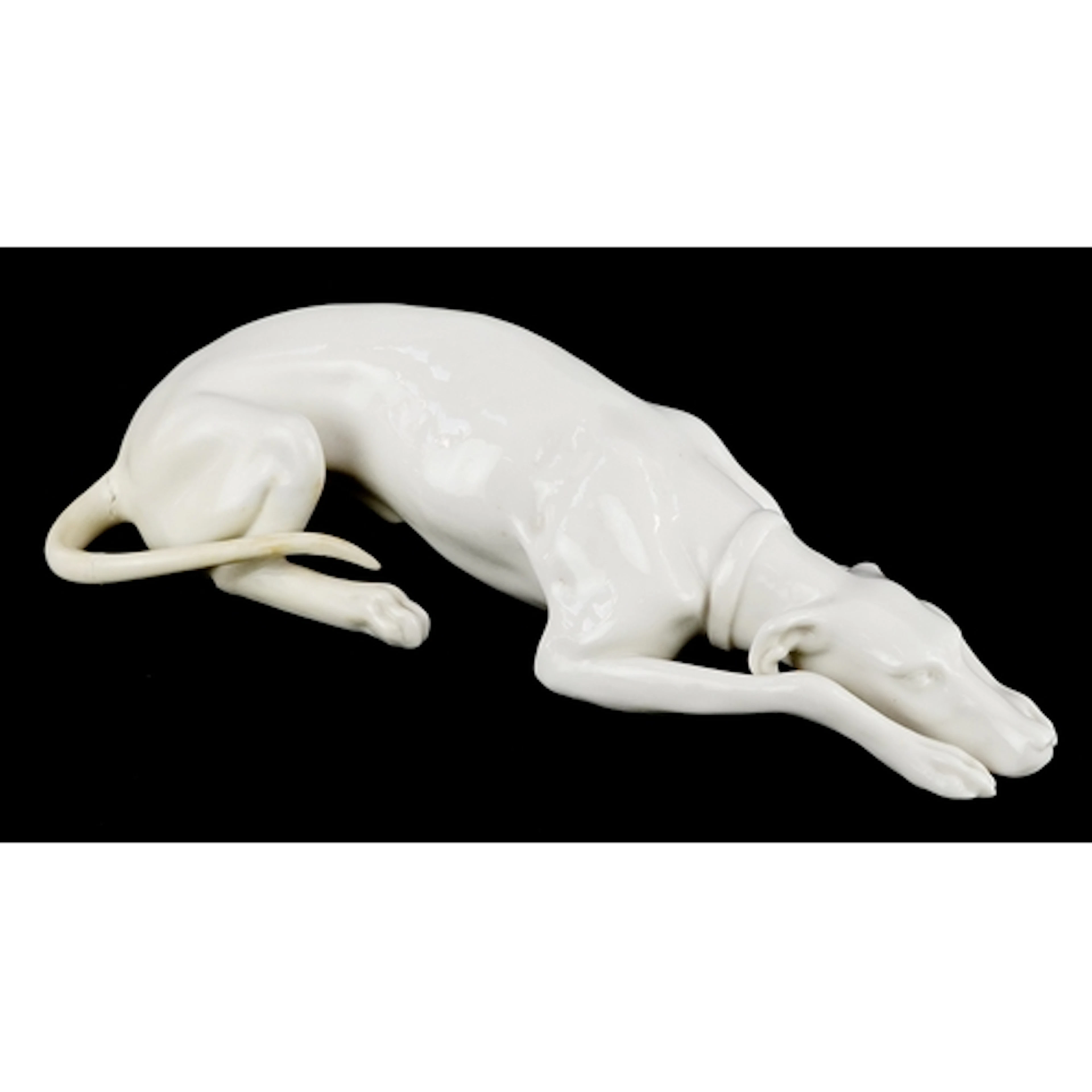 Nymphenburg German pottery figure of a recumbent Greyhound, ...