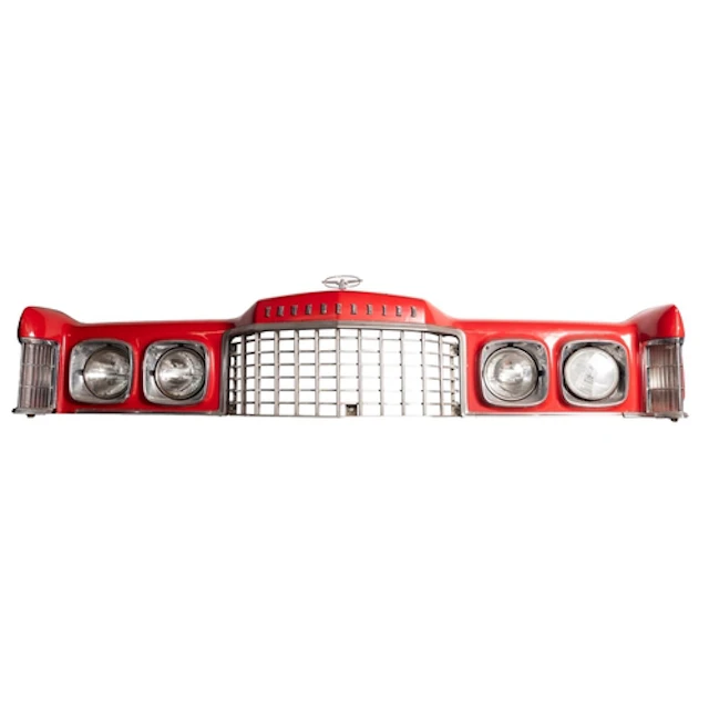 A 1970s Ford Thunderbird front grille. In red with chrome tr...