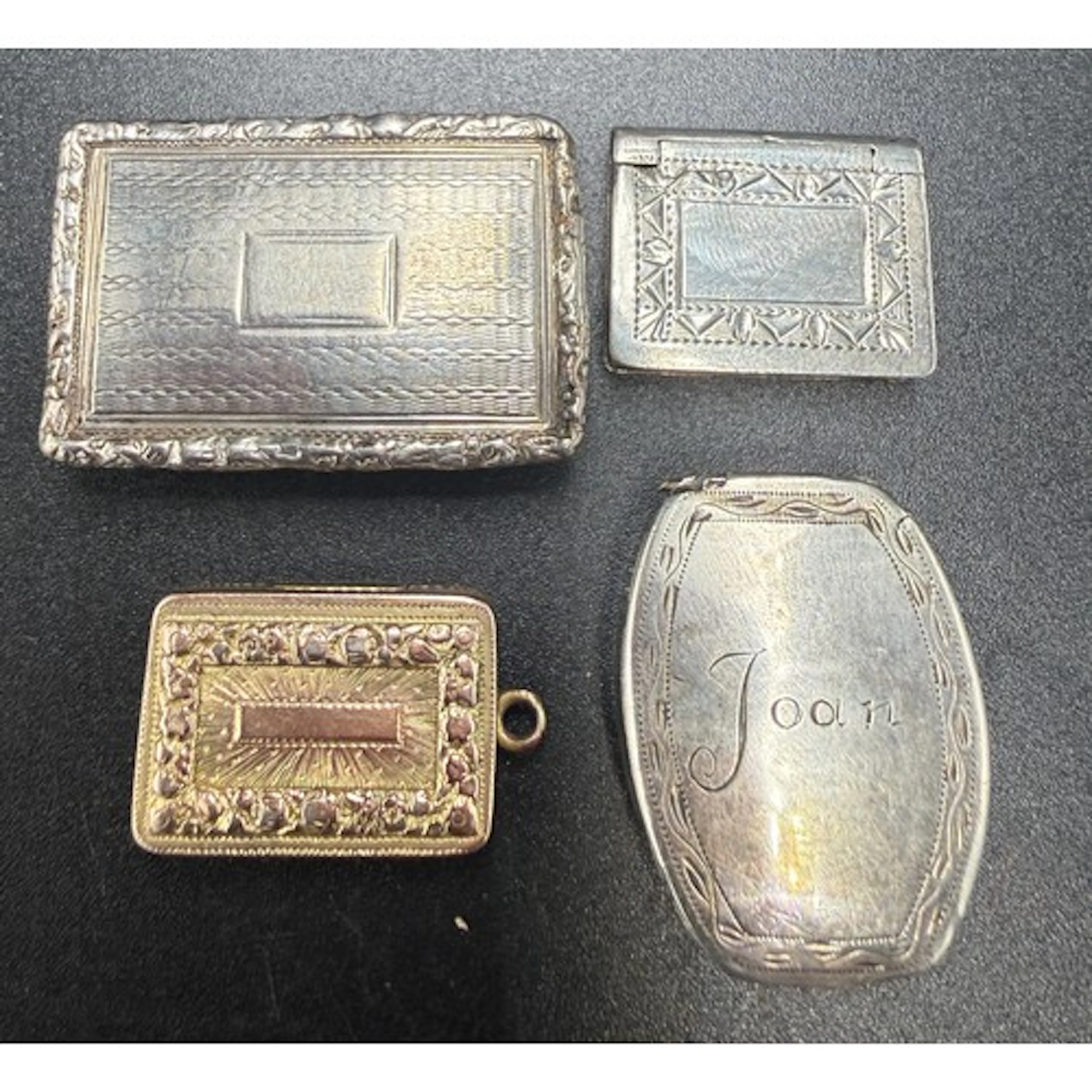 Four Georgian hallmarked silver vinaigrettes to include Birm...