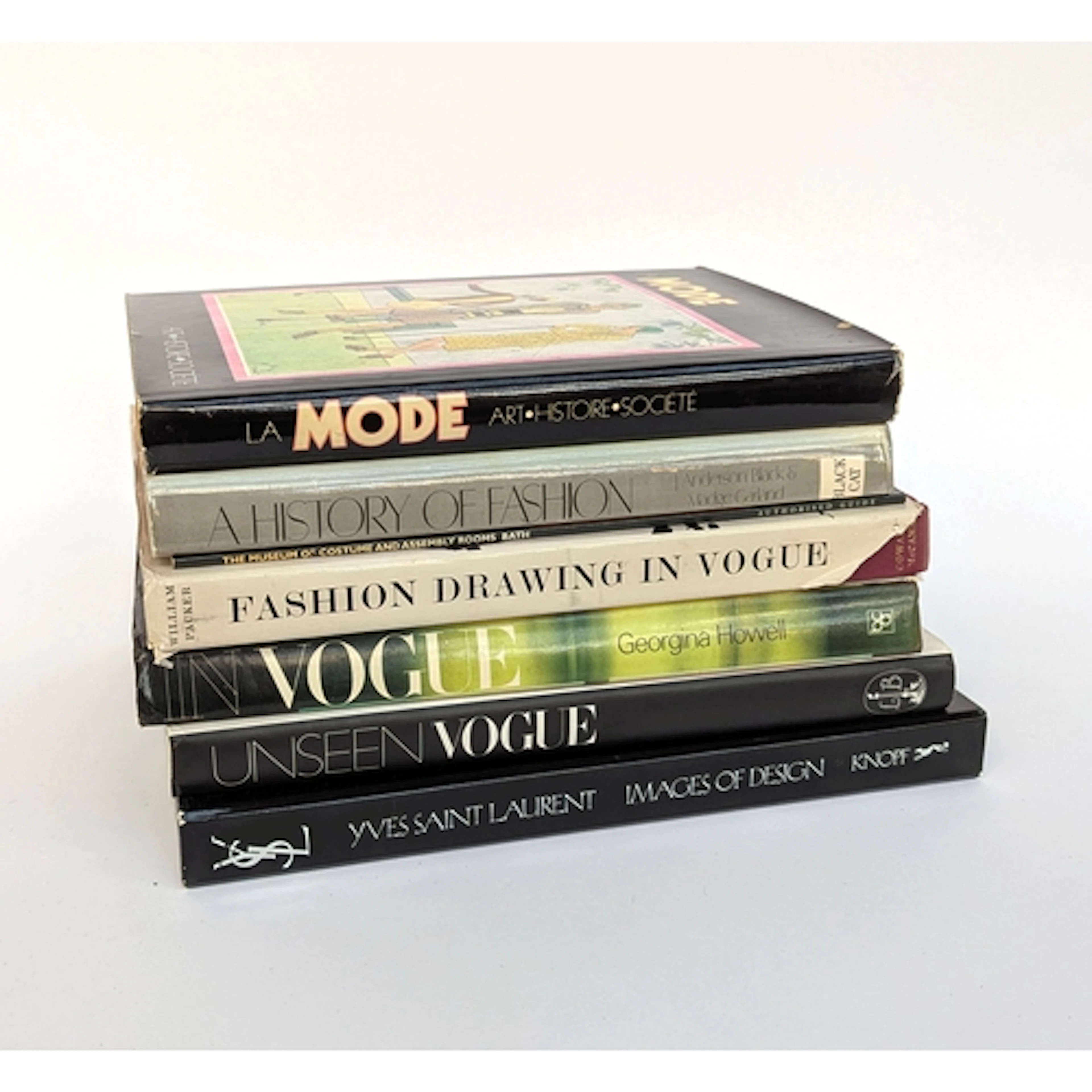 BOOKS, HIGH-END FASHION. A group of large format books inclu...
