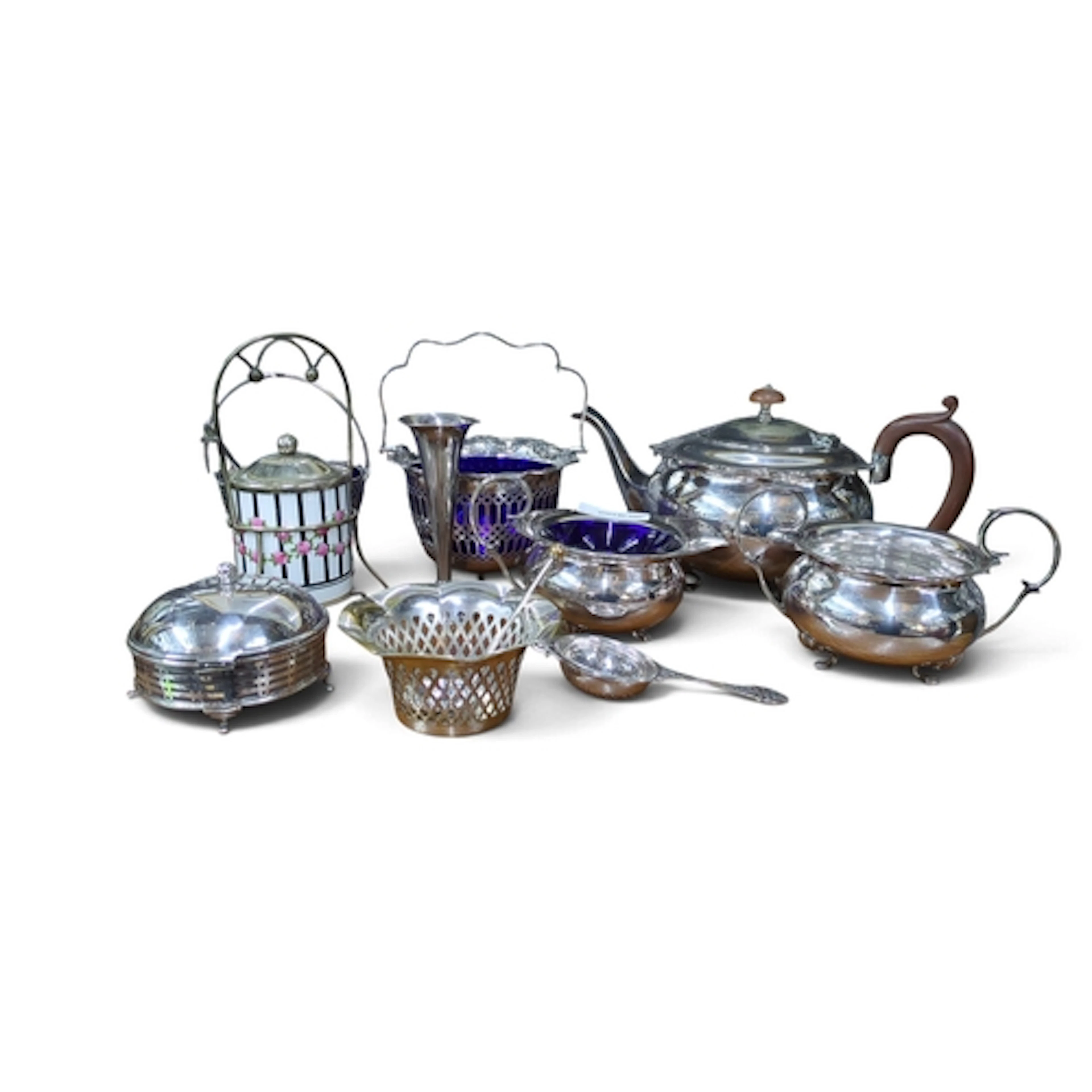 A group of silver-plated tablewares, including a teapot, pie...