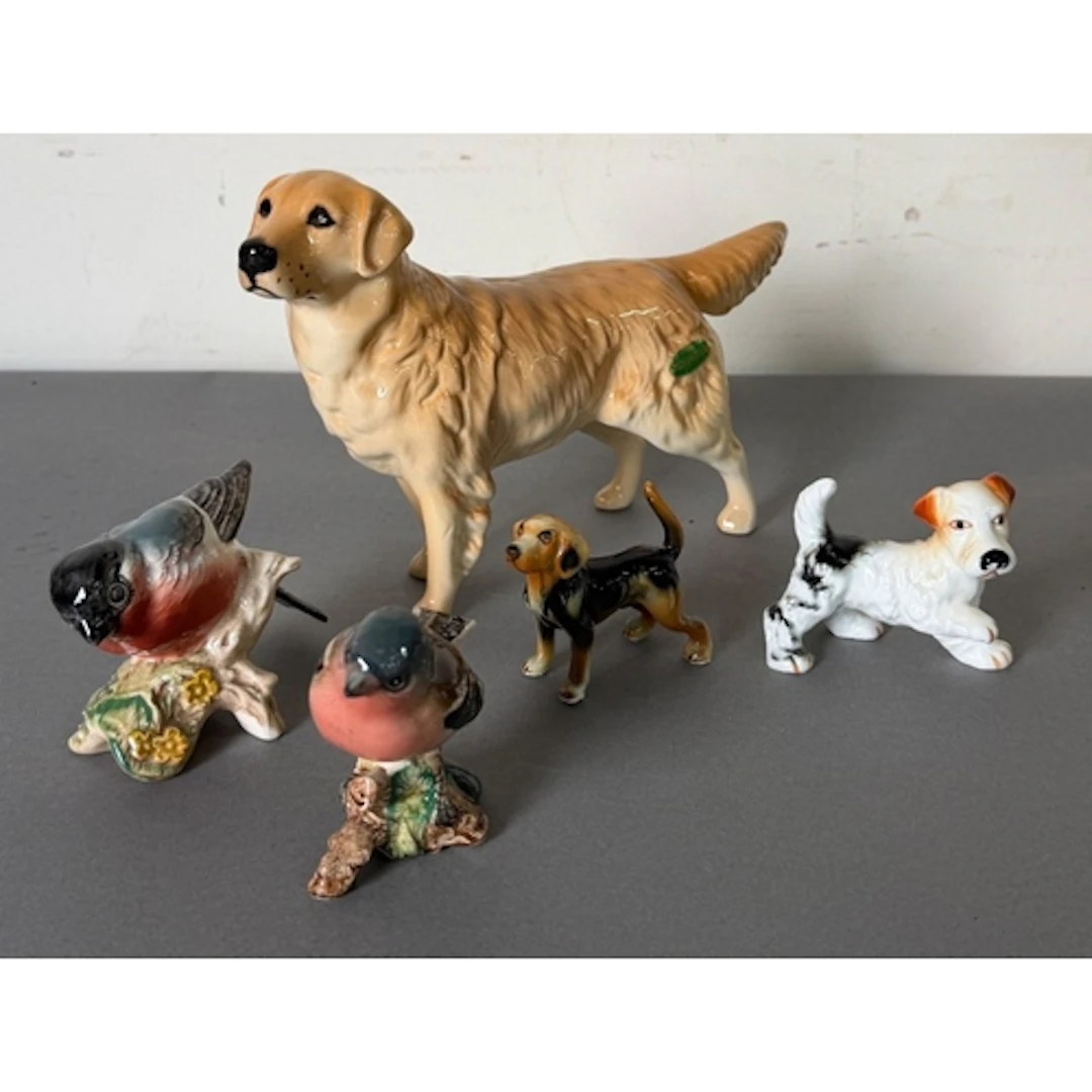 A selection of ceramic dogs figures including Beswick ...