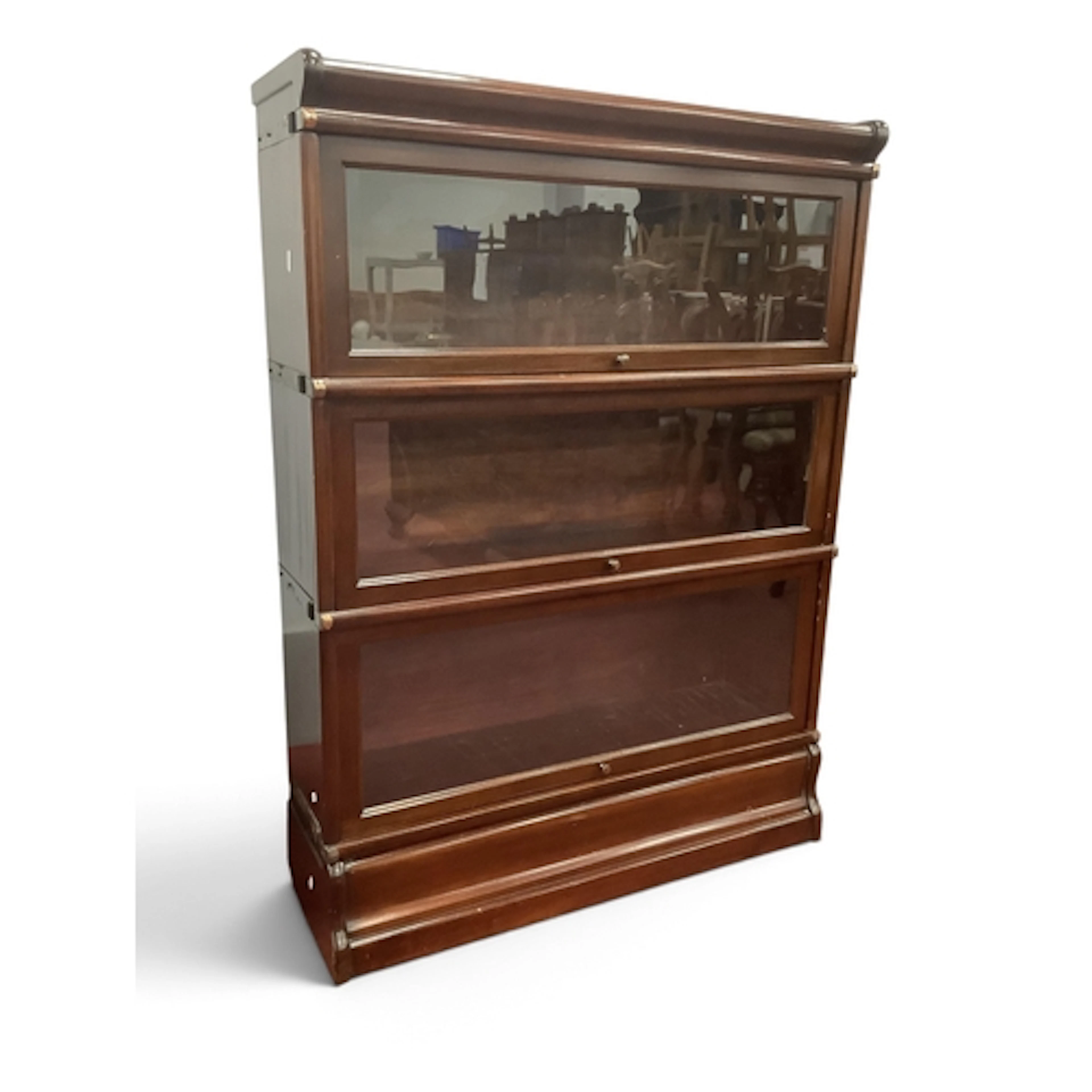 A Mahogany Sectional Bookcase, in the Globe Wernicke manner,...