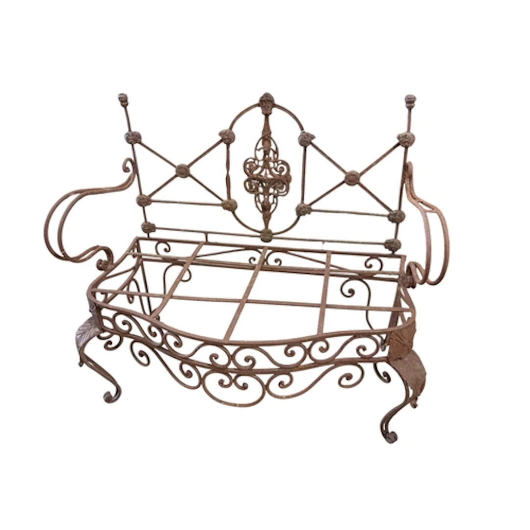 A wrought iron garden bench, width 107cm, depth 54cm, height...
