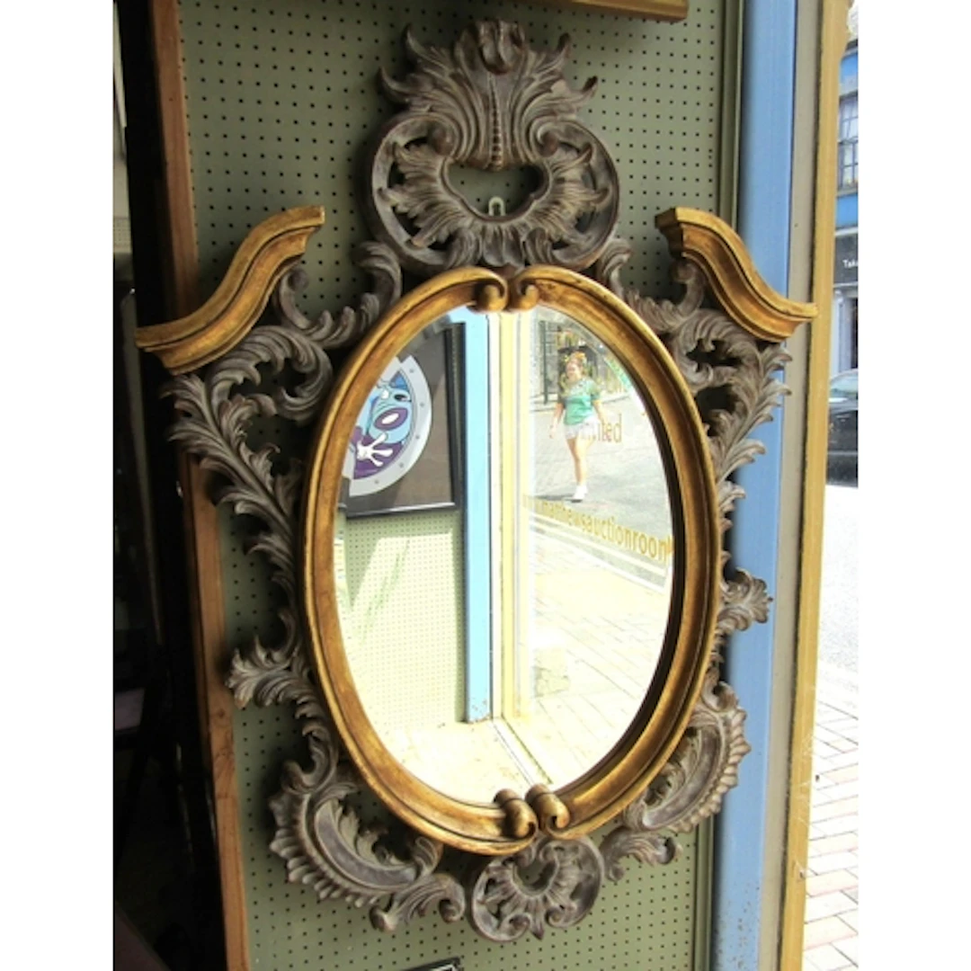 Carved Giltwood Oval Form Wall Mirror with Upper Cartouche D...