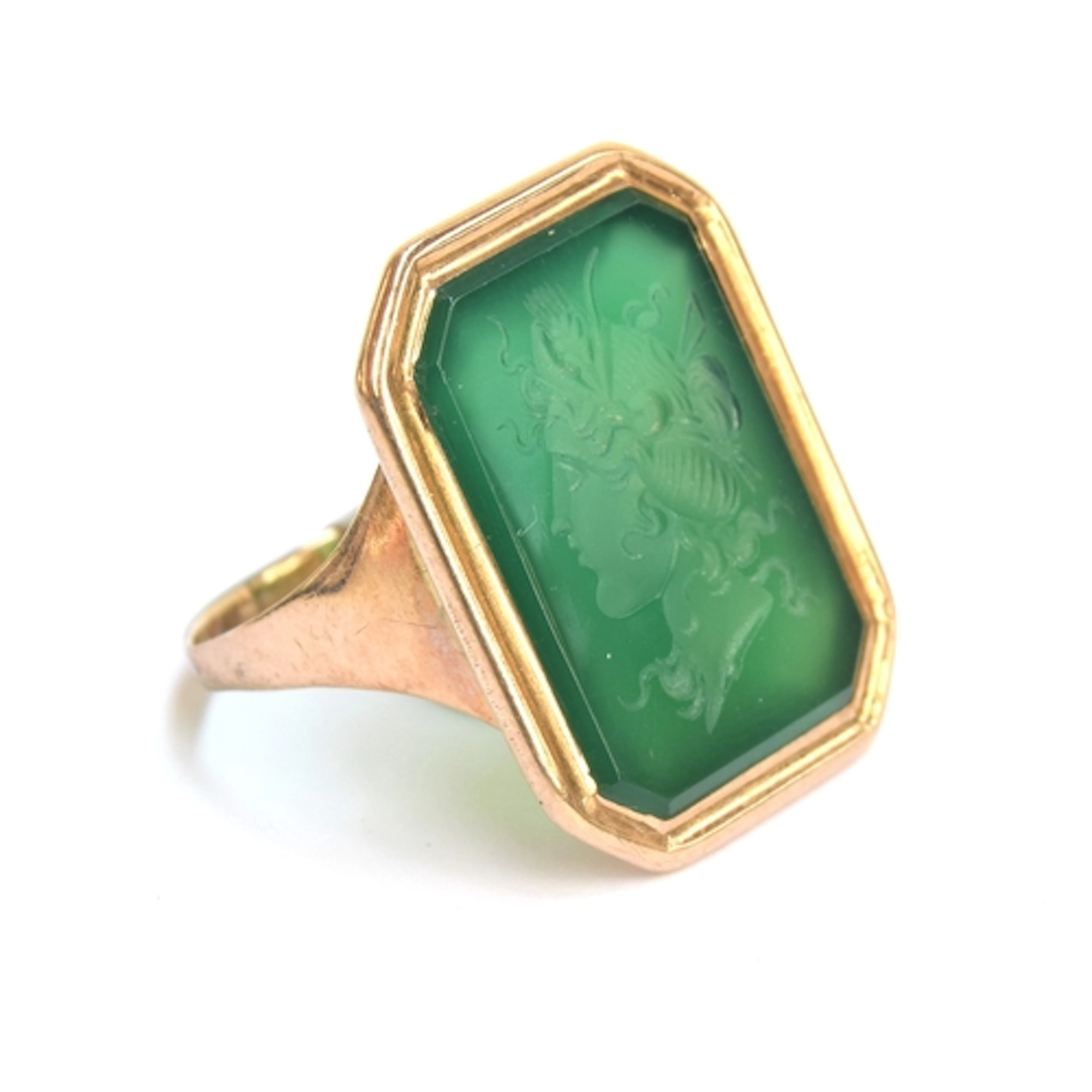 A 19th century gold mounted green agate intaglio ring, the a...