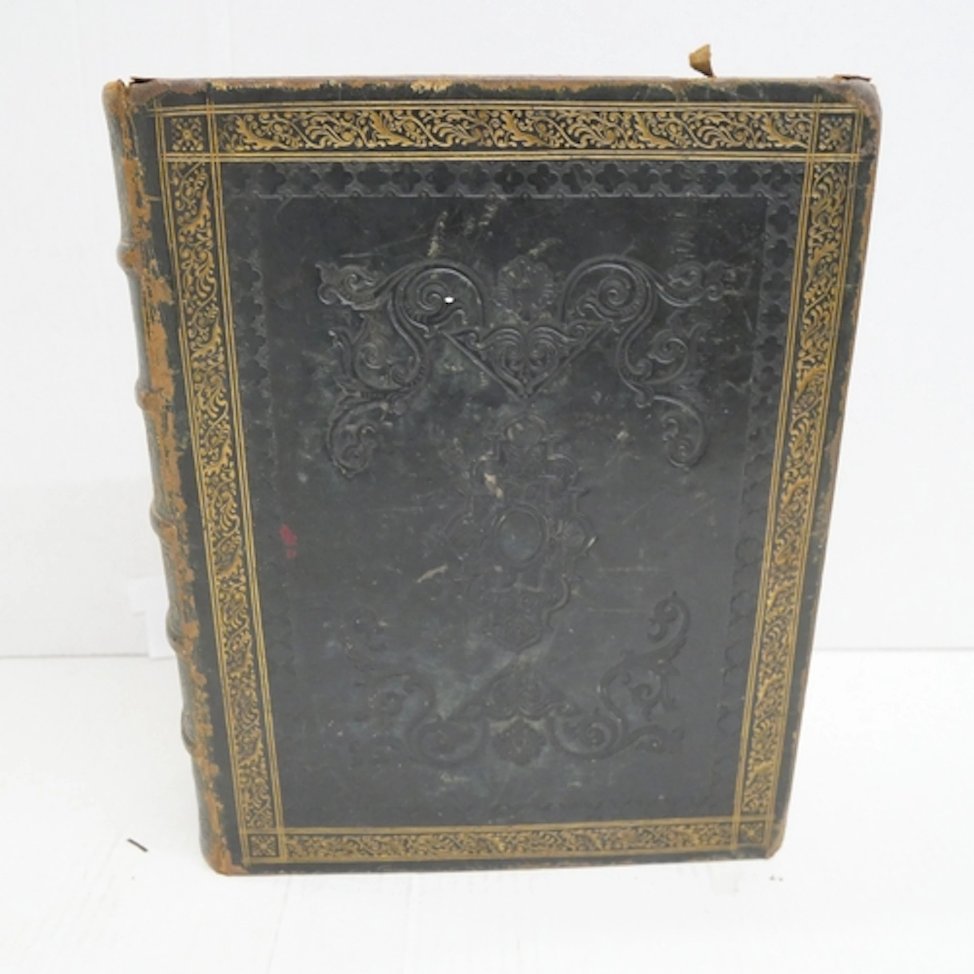 A 19th Century large leather bound Bible; The Self-Interpret...