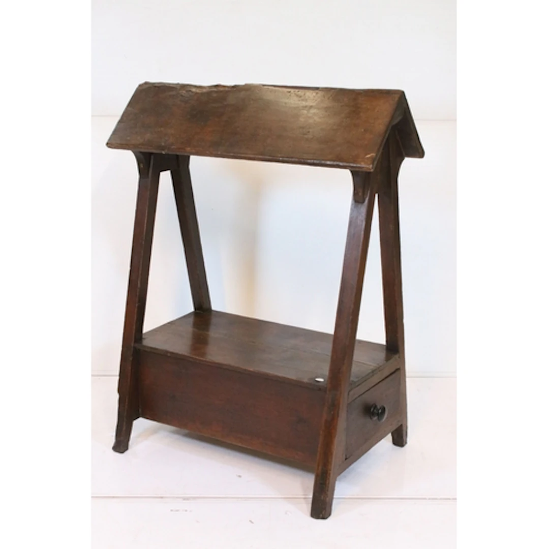 Victorian oak saddle horse, having pitched top on splayed su...