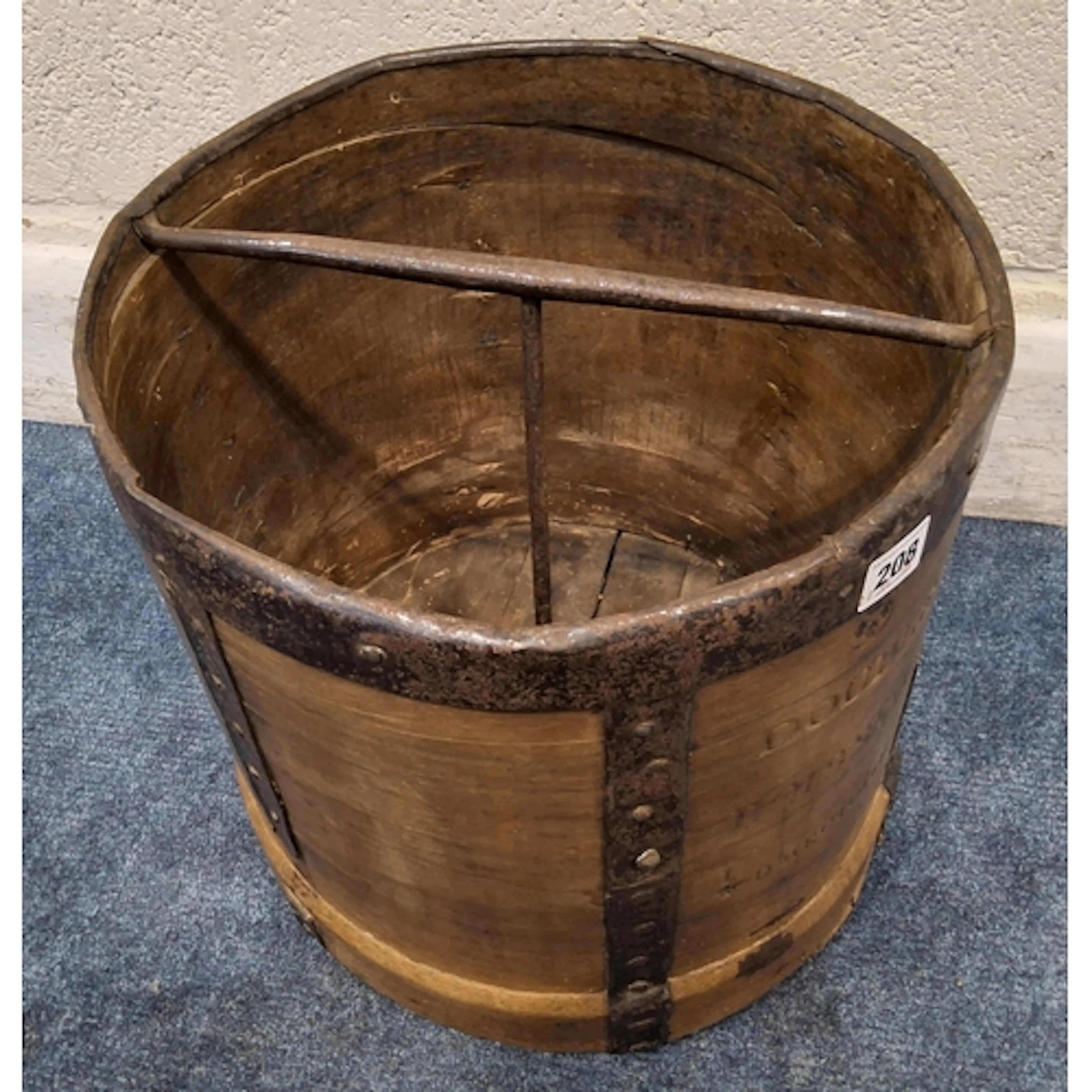 A WOODEN GRAIN BUCKET, stamped "DOUBLE BOISSEAU 1/4 D'HECTOL...