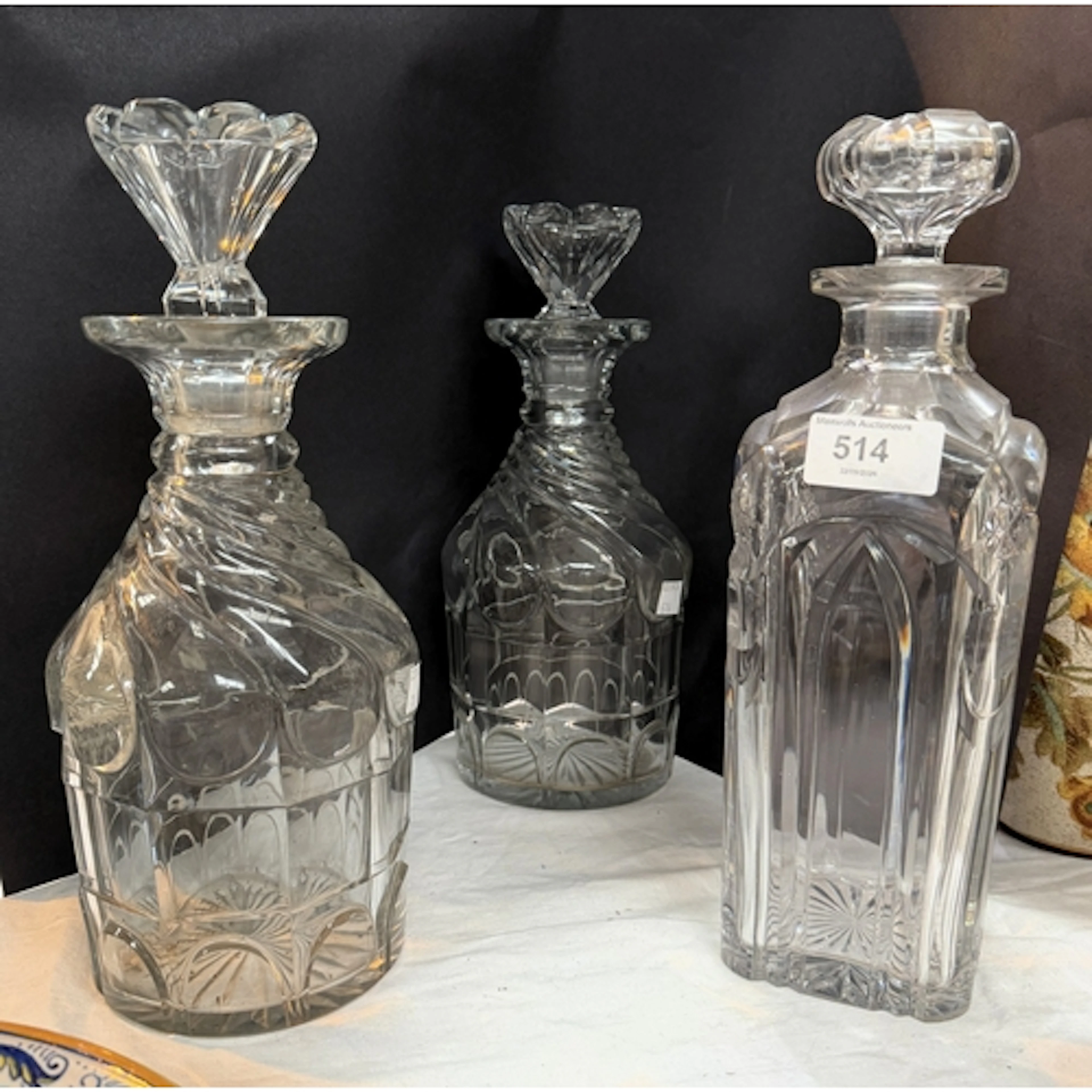 A Victorian Gothic style decanter, 29cm, a pair of Georgian ...