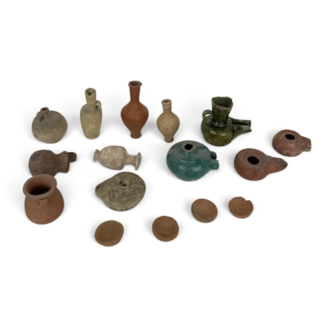 A COLLECTION OF ROMAN AND GRECO-ROMANO TERRACOTTA VASES, OIL...