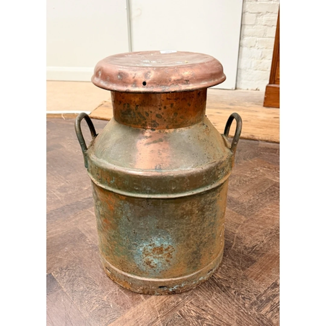 An old copper milk churn
