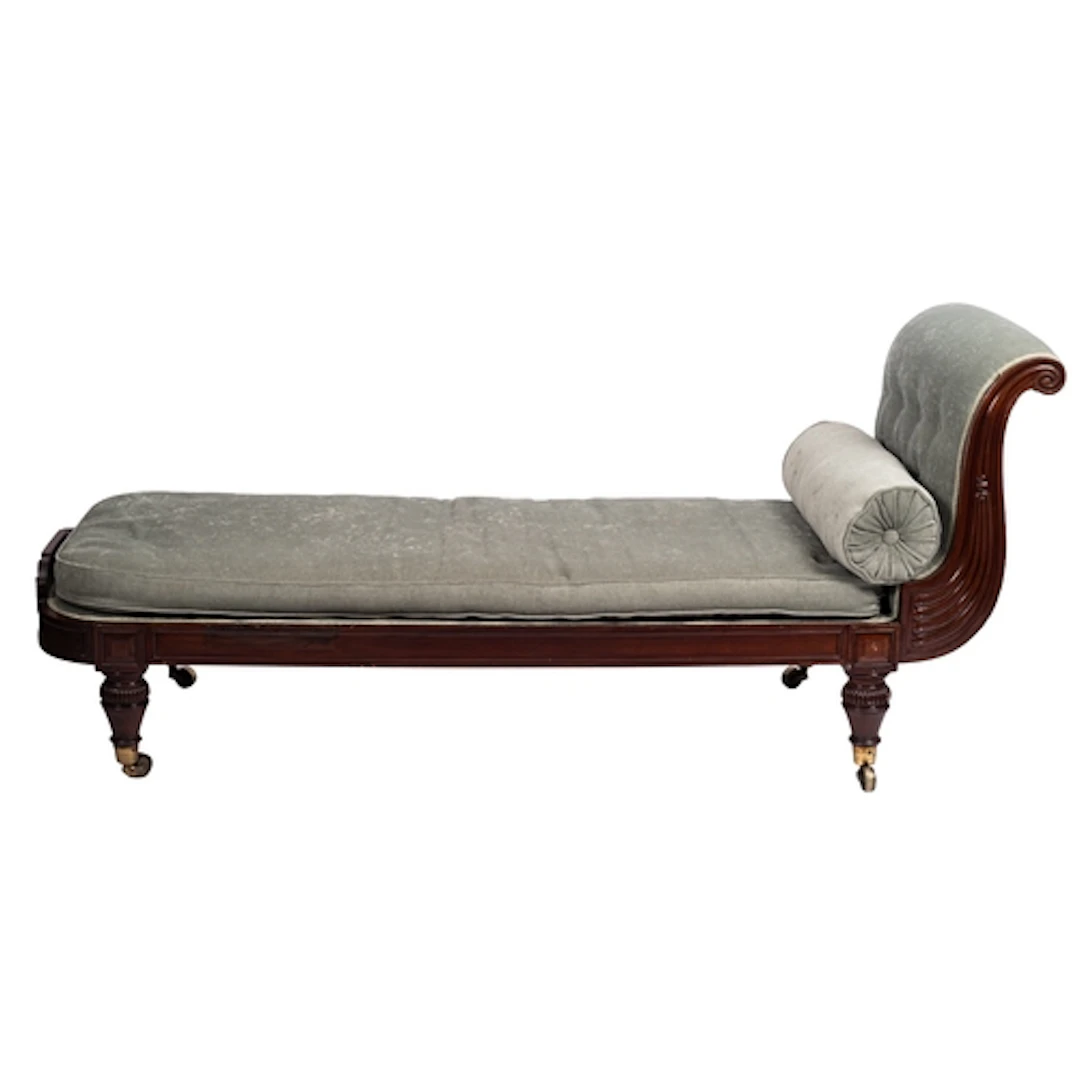 A George IV mahogany and upholstered daybed, circa 1825; the...