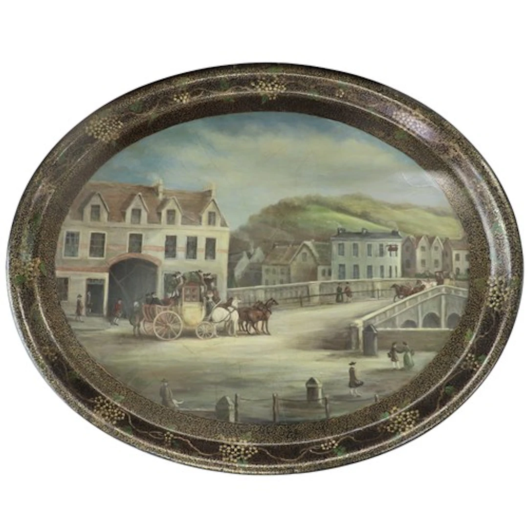 A LARGE DECORATIVE OVAL LACQUER TRAY painted with a Regency-...