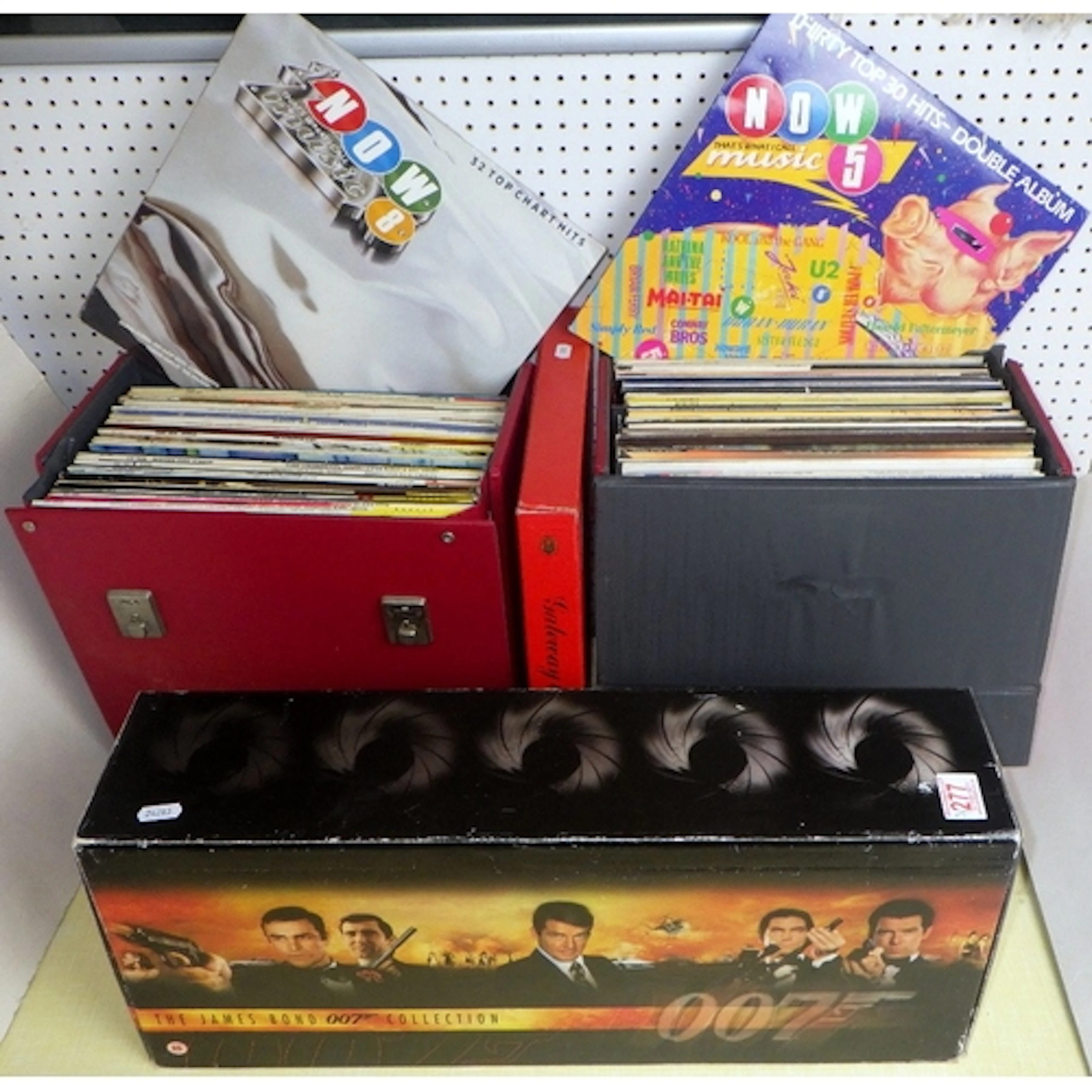 A qty of mixed genre LPs together with a James Bond VHS box ...