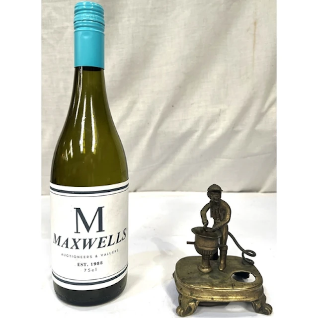 A 19th century novelty table bell, 11.5cm high