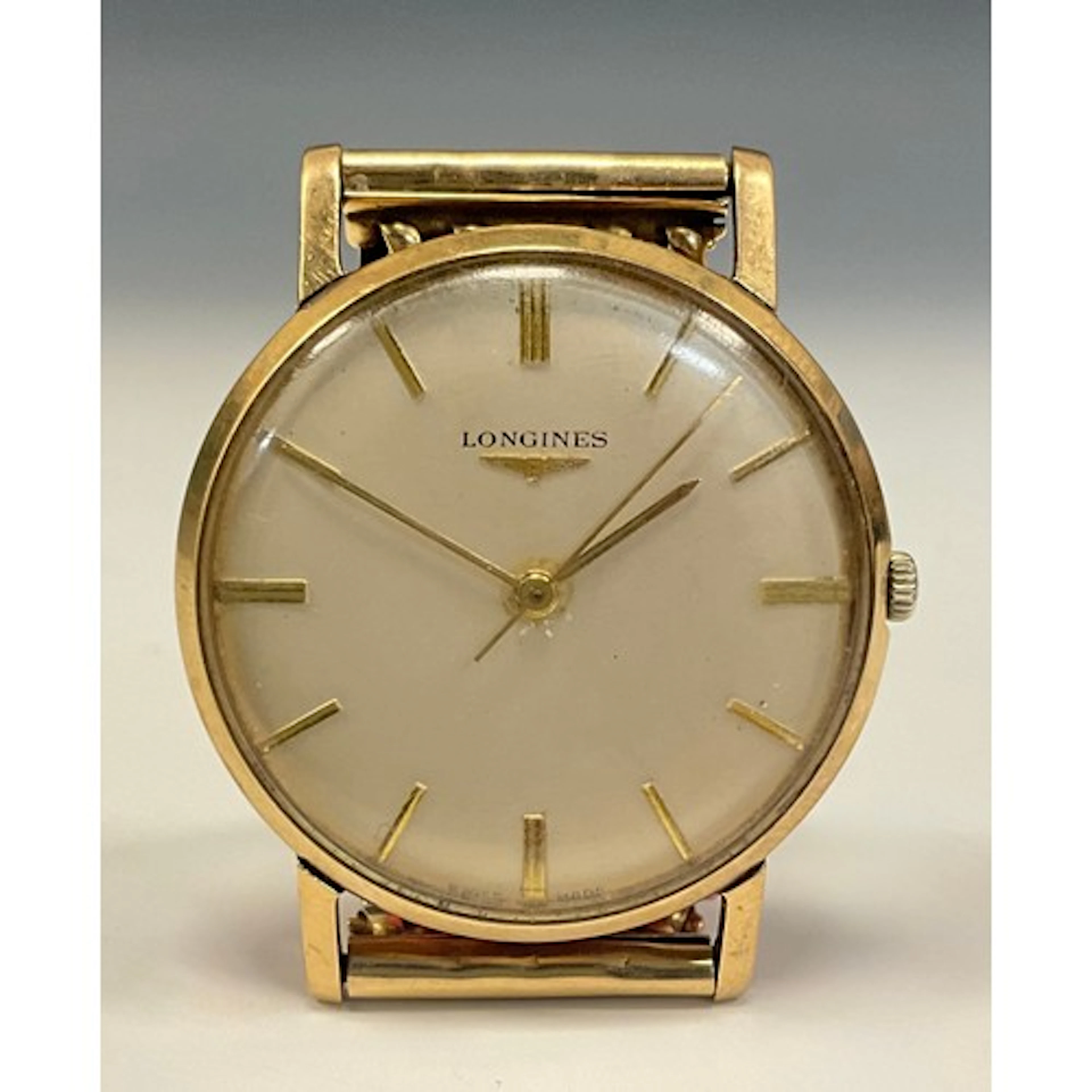 Longines - a 1980s 9ct gold cased wristwatch, silver dial, r...