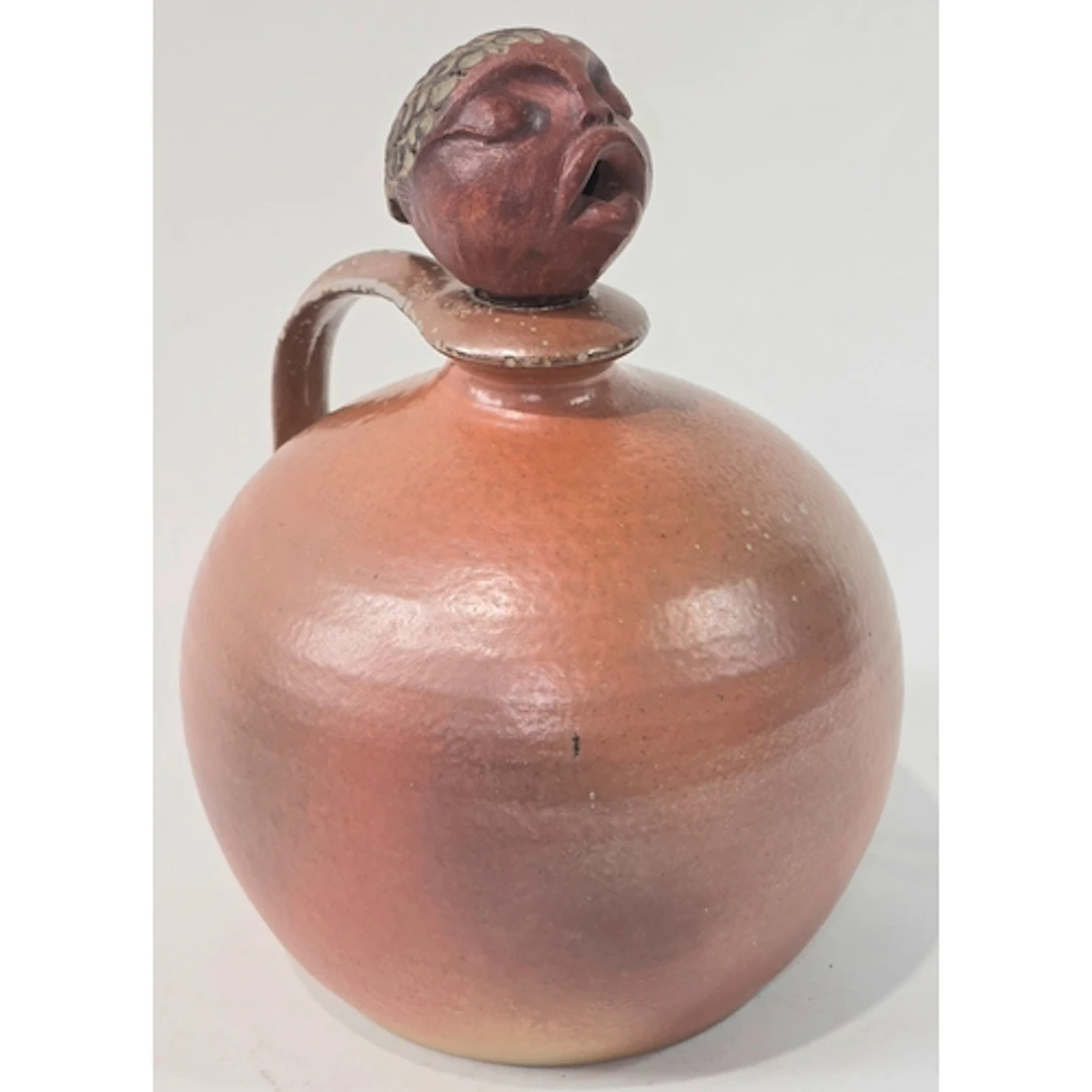 Poole Pottery interest Guy Sydenham decanter with head stopp...