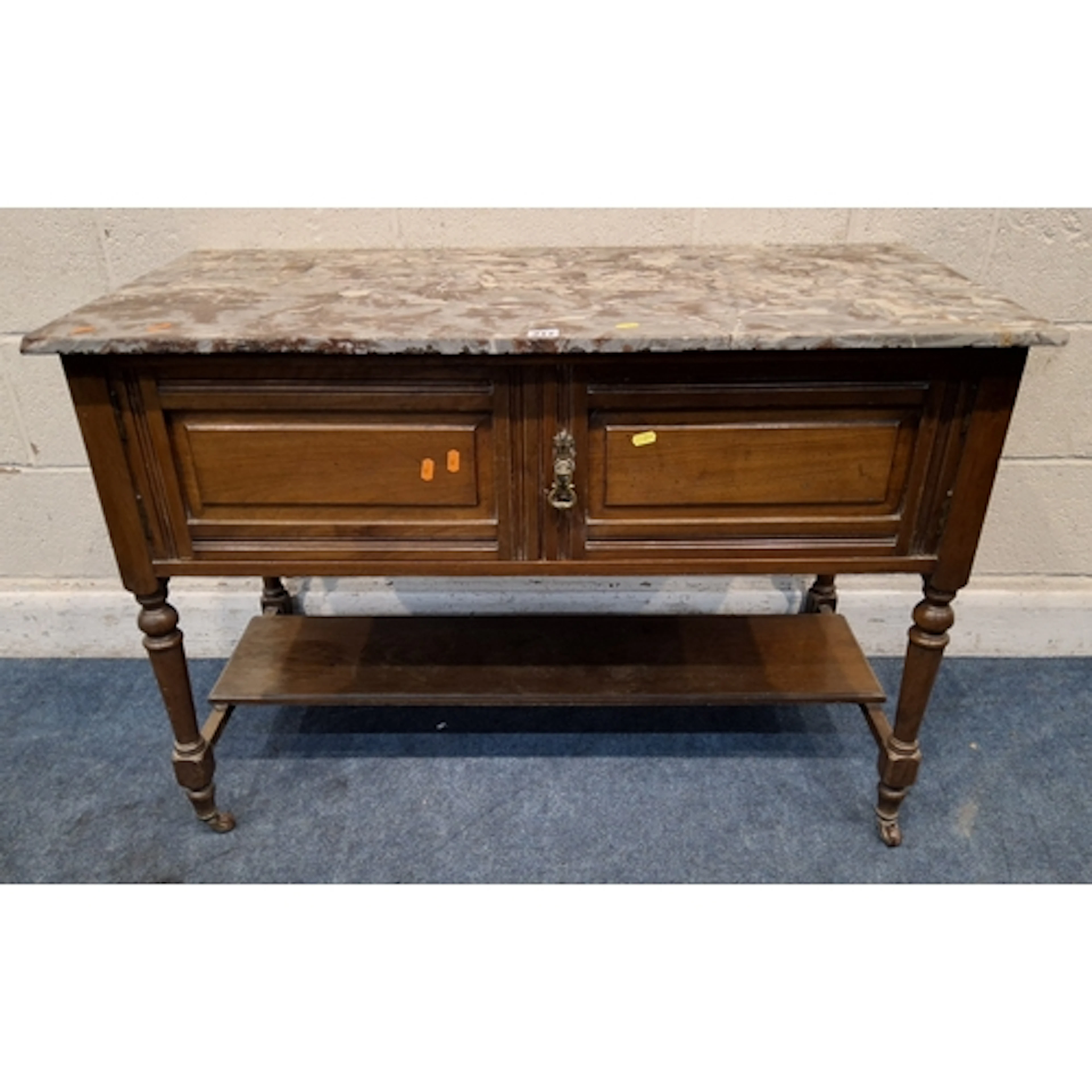 AN EARLY 20TH CENTURY MARBLE TOP WASH STAND, with double cup...