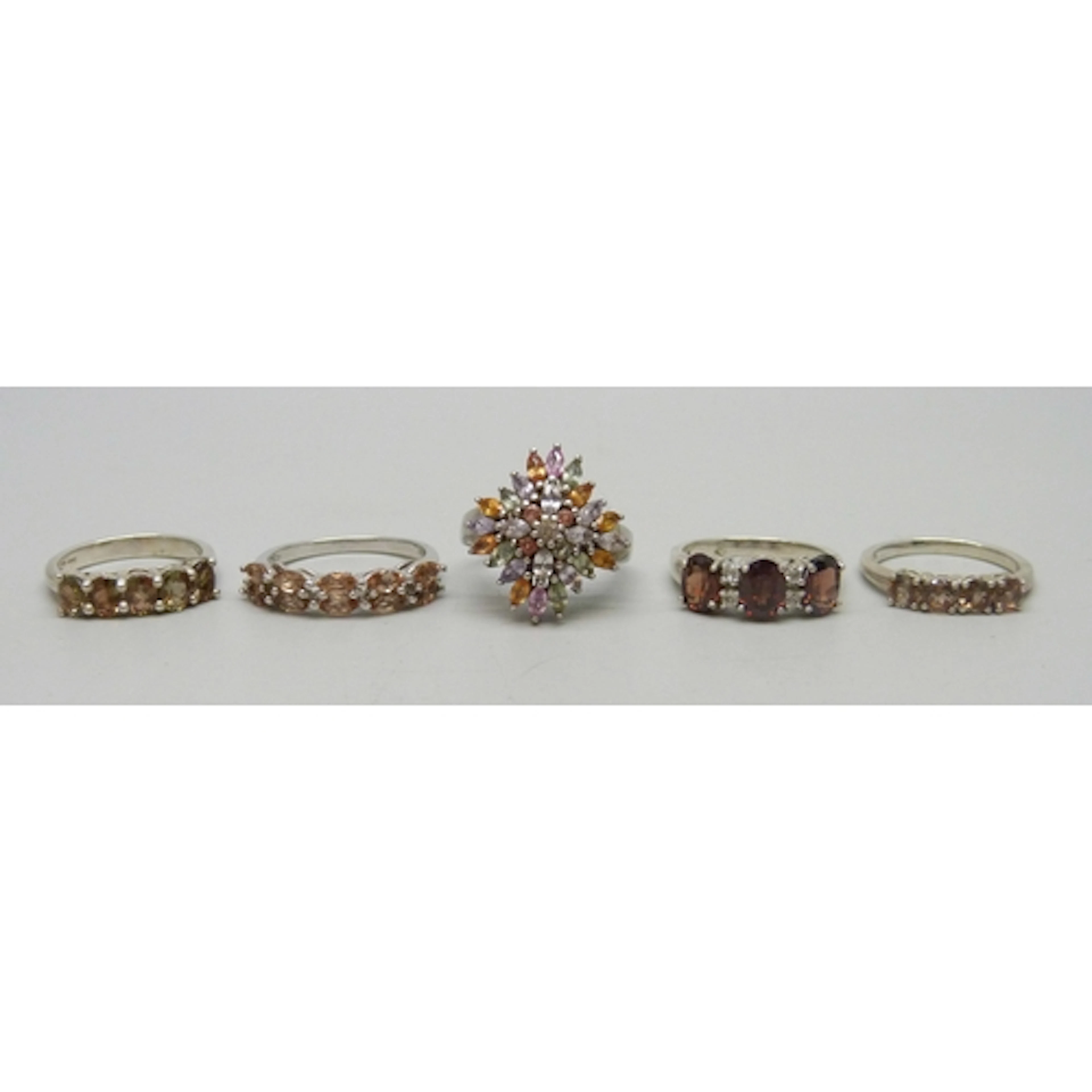 Five TGGC silver and gemstone rings, 17g total