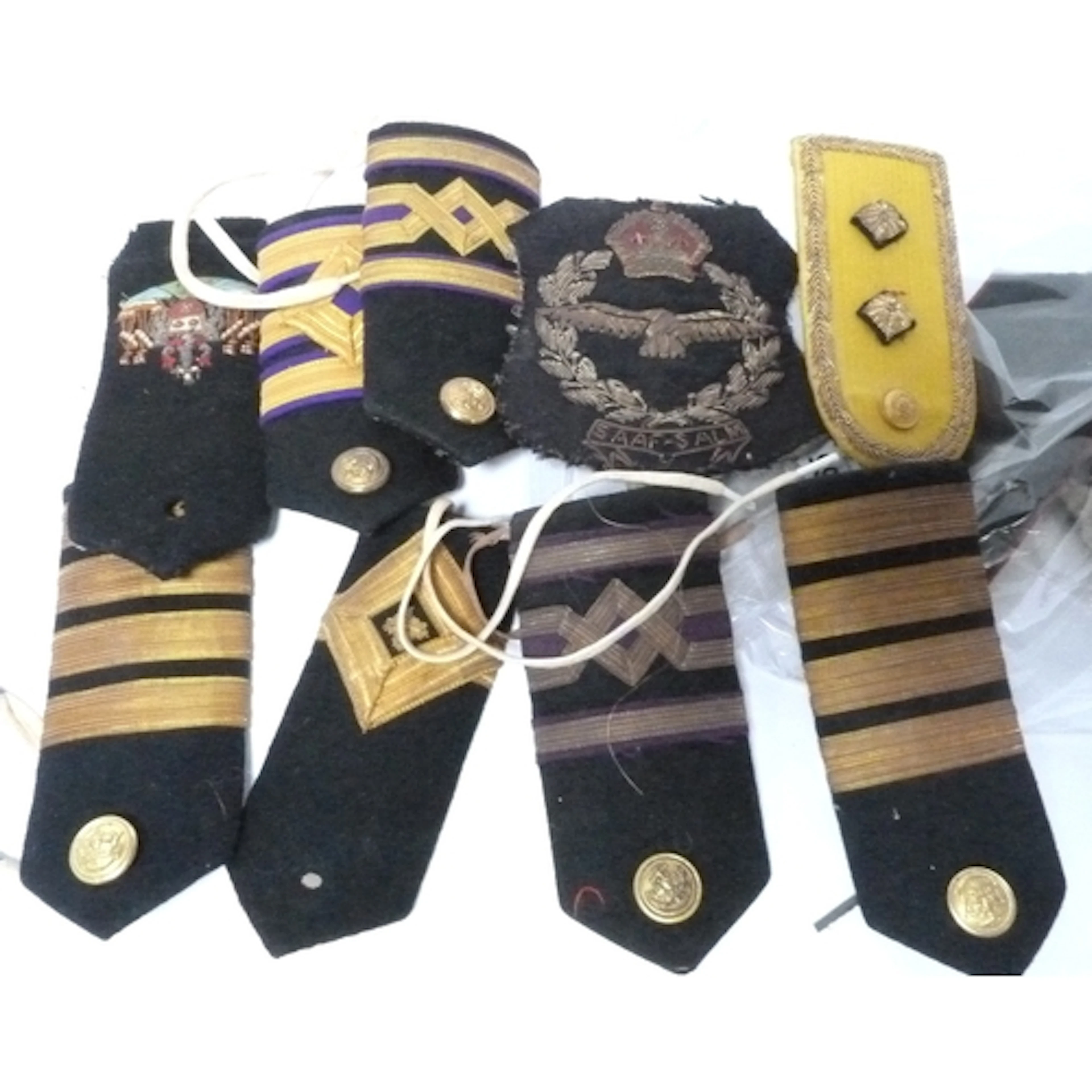 Collection of vintage Naval and Military insignia cloth shou...