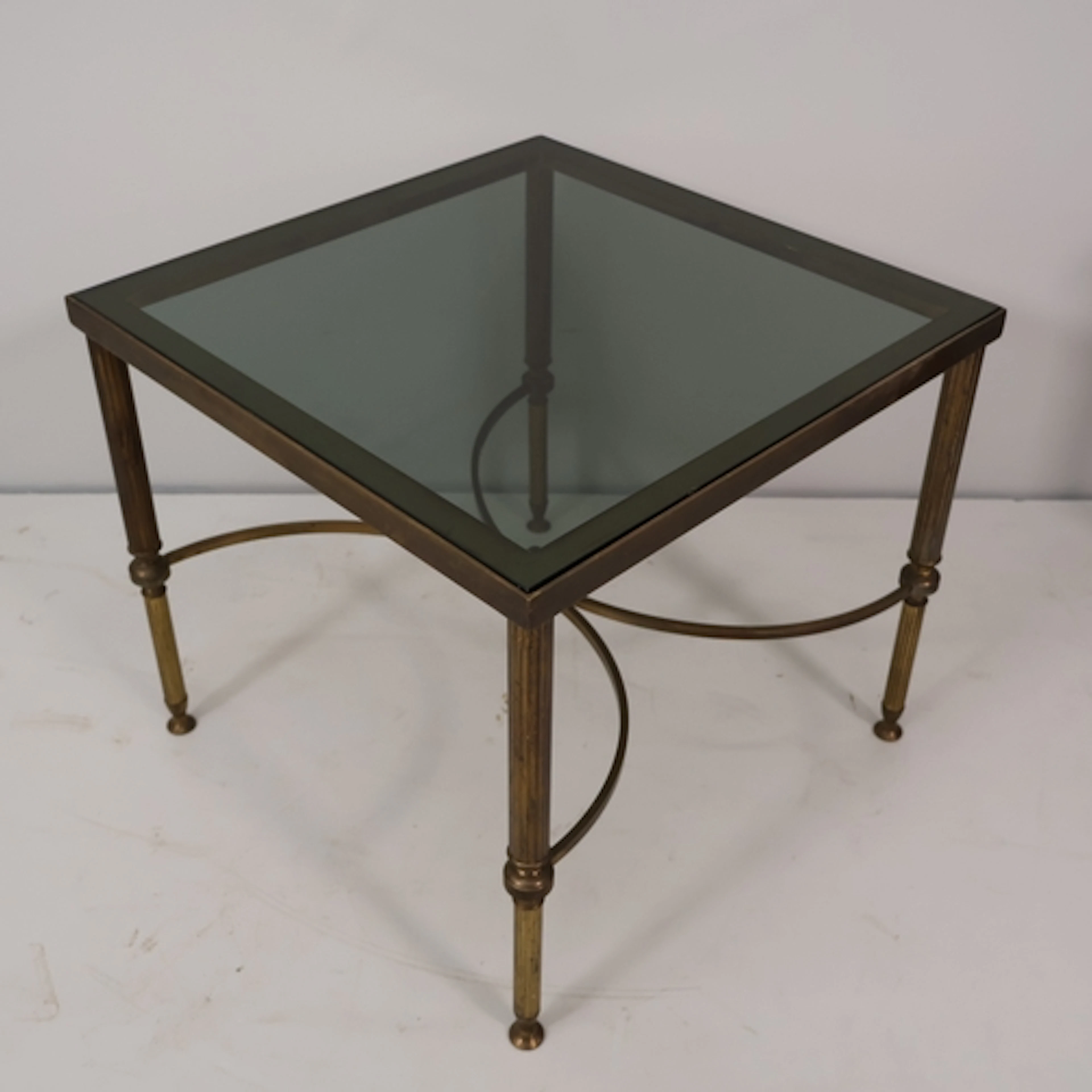 A Mid Century French Hollywood regency style coffee table in...