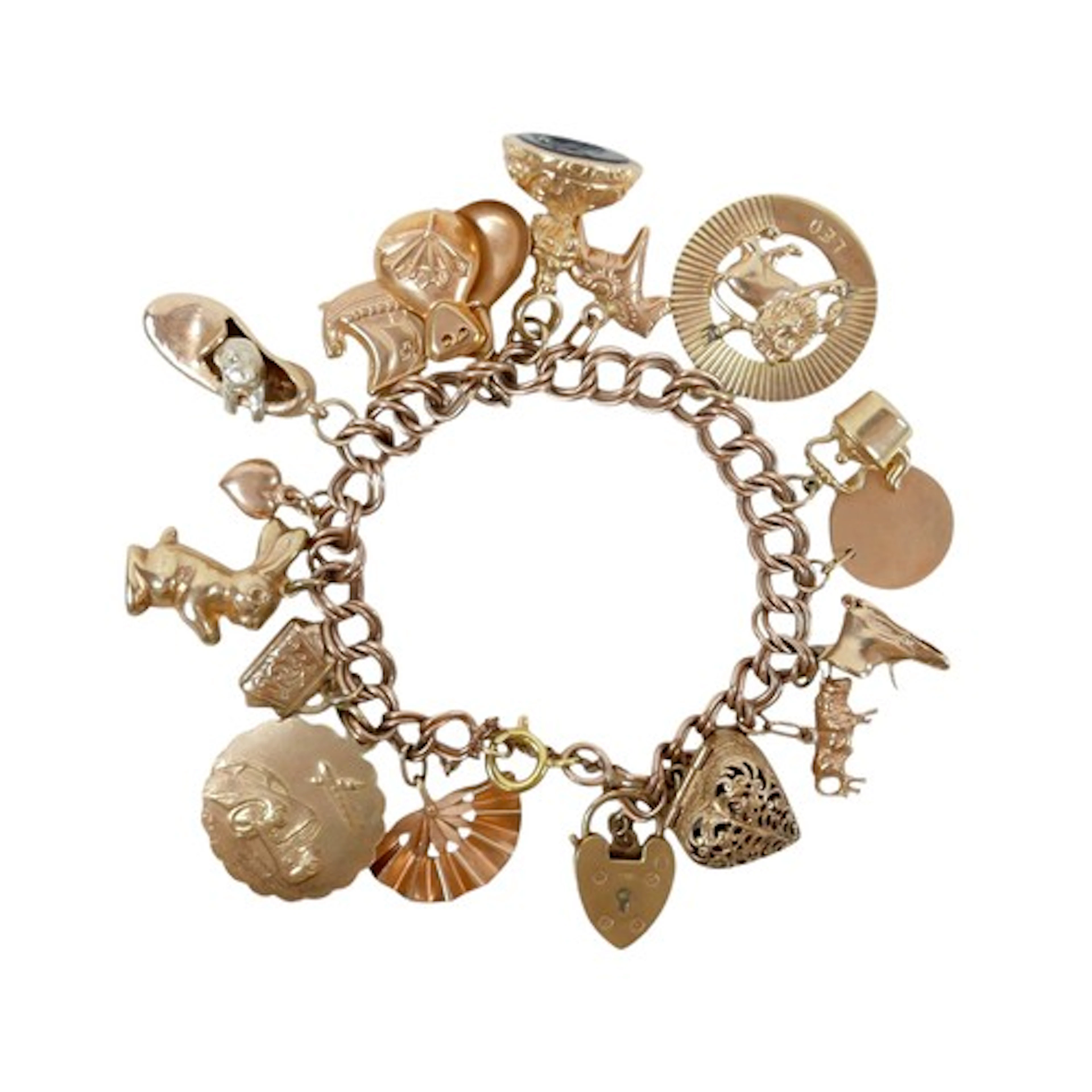 A 9ct rose gold charm bracelet with 18ct yellow gold clasp a...