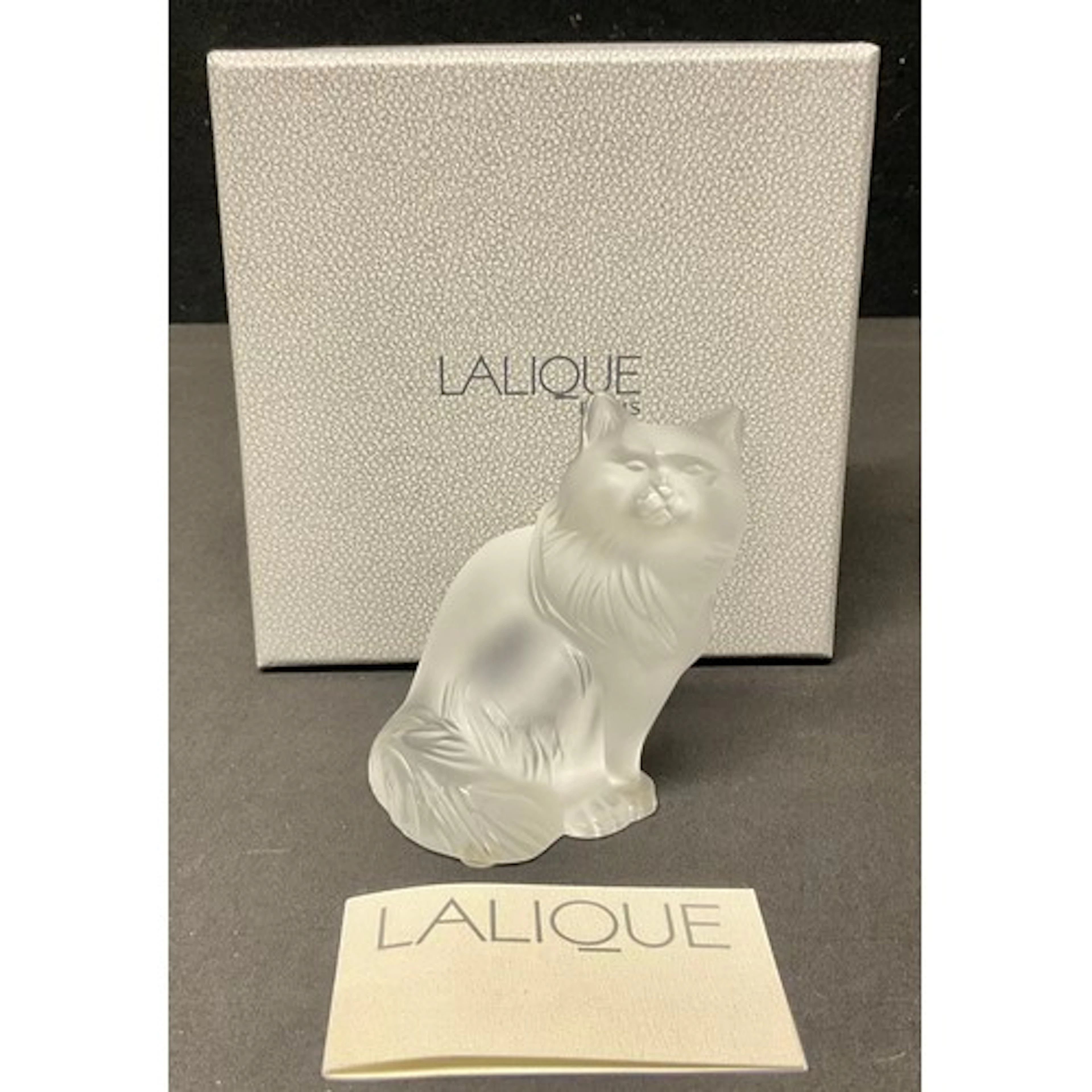 A Lalique crystal glass model as a seated cat, Heggie, 8cm h...