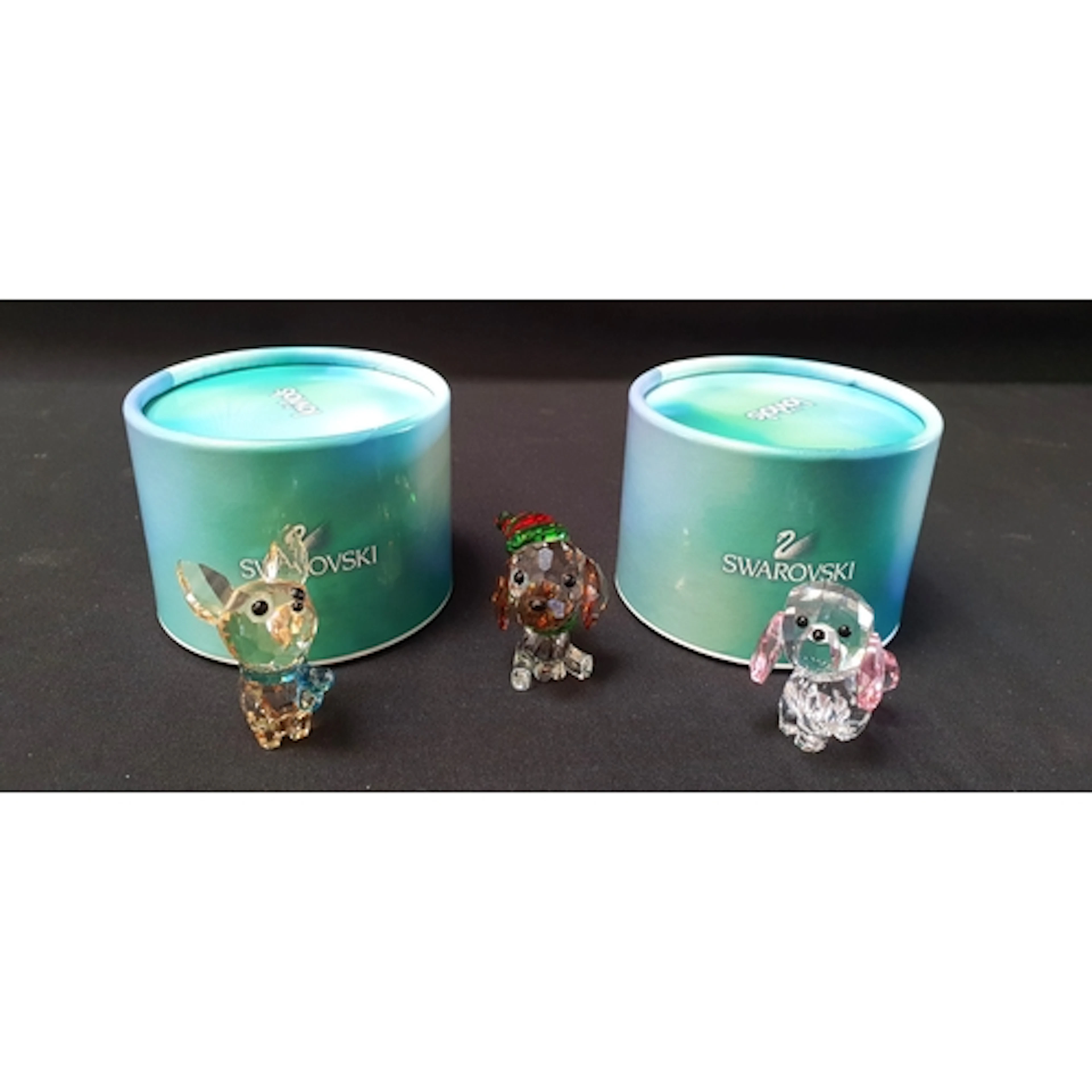 THREE SWAROVSKI PUPPY DOG FIGURINES comprising 'Lovlots Pupp...