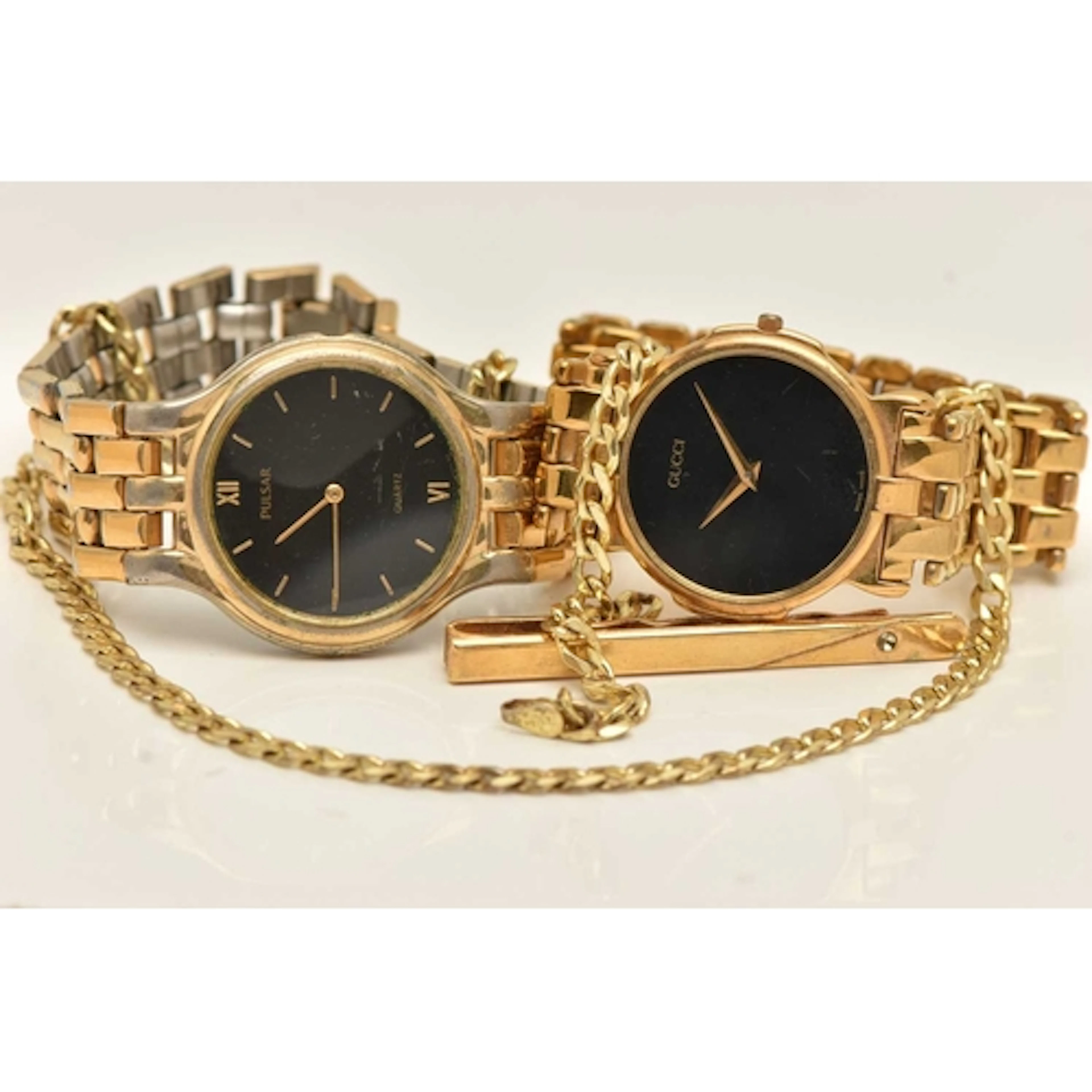 A SMALL ASSORTMENT OF ITEMS, to include a gold plated silver...