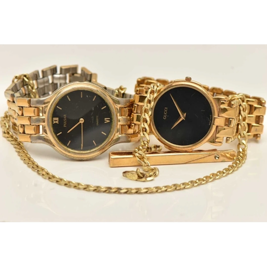 A SMALL ASSORTMENT OF ITEMS, to include a gold plated silver...