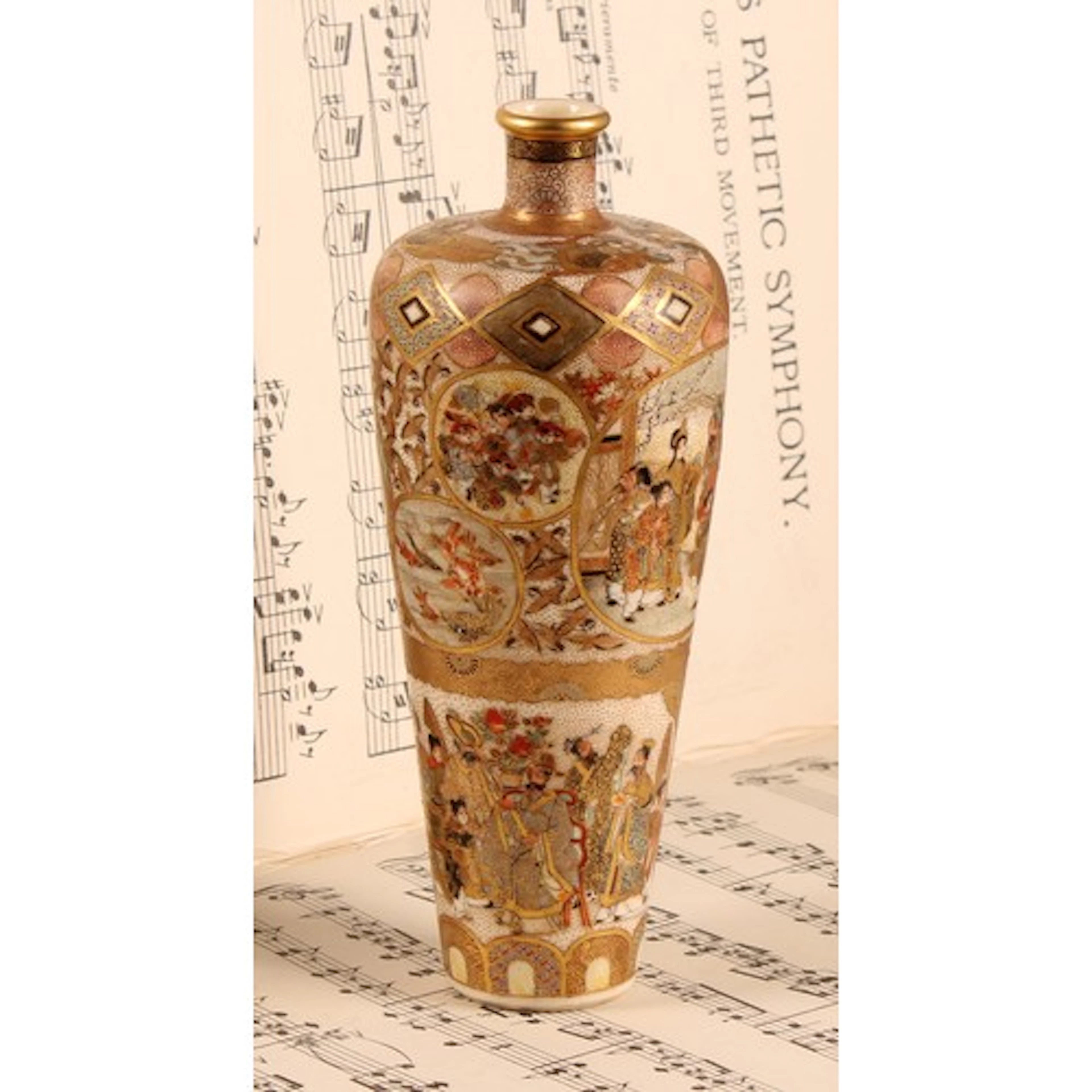 A Japanese Satsuma vase, decorated in the traditional palett...