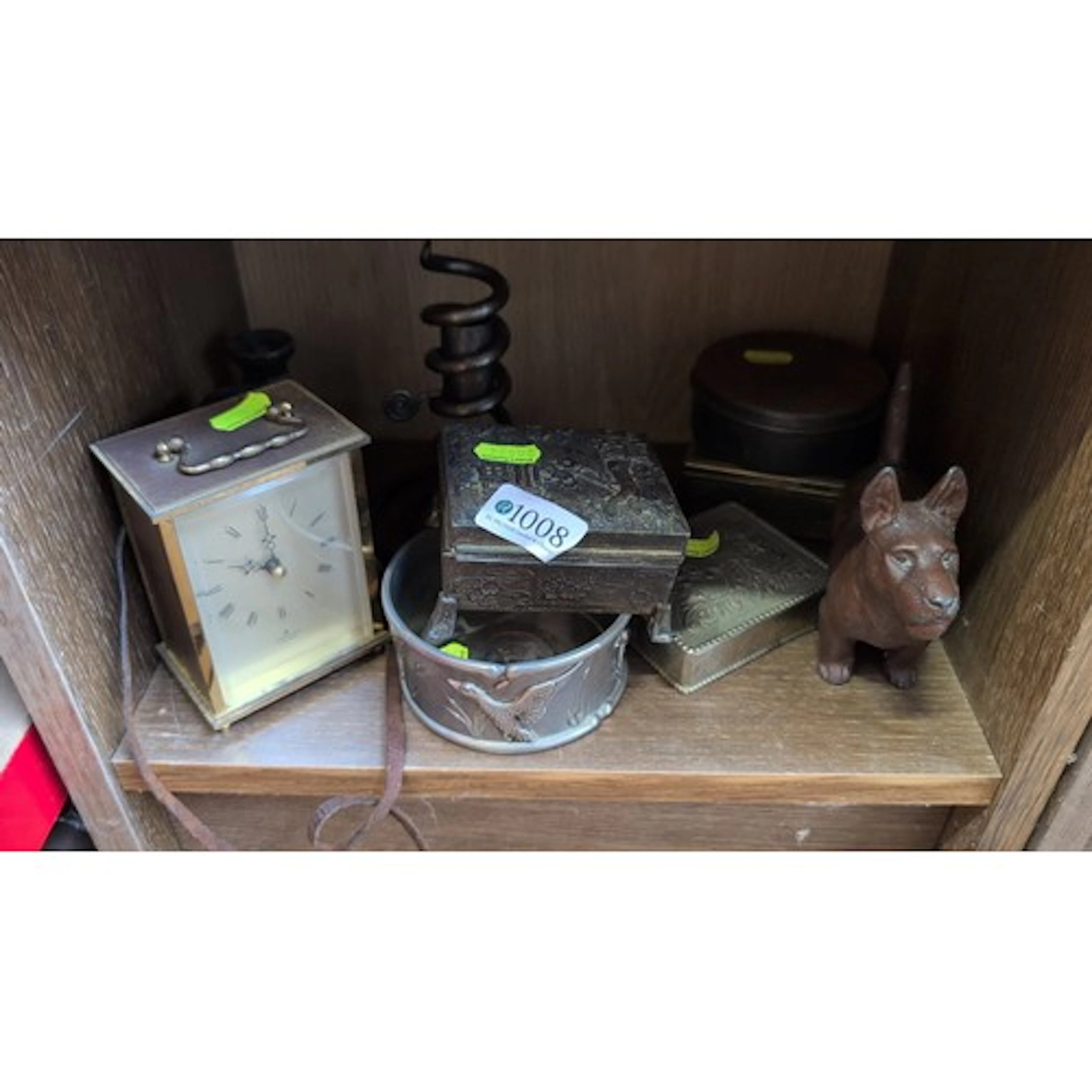 A group of assorted desk and vanity objects, including an en...