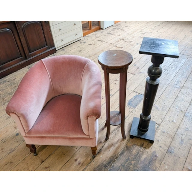 A late Victorian plant stand together with an ebony plant st...