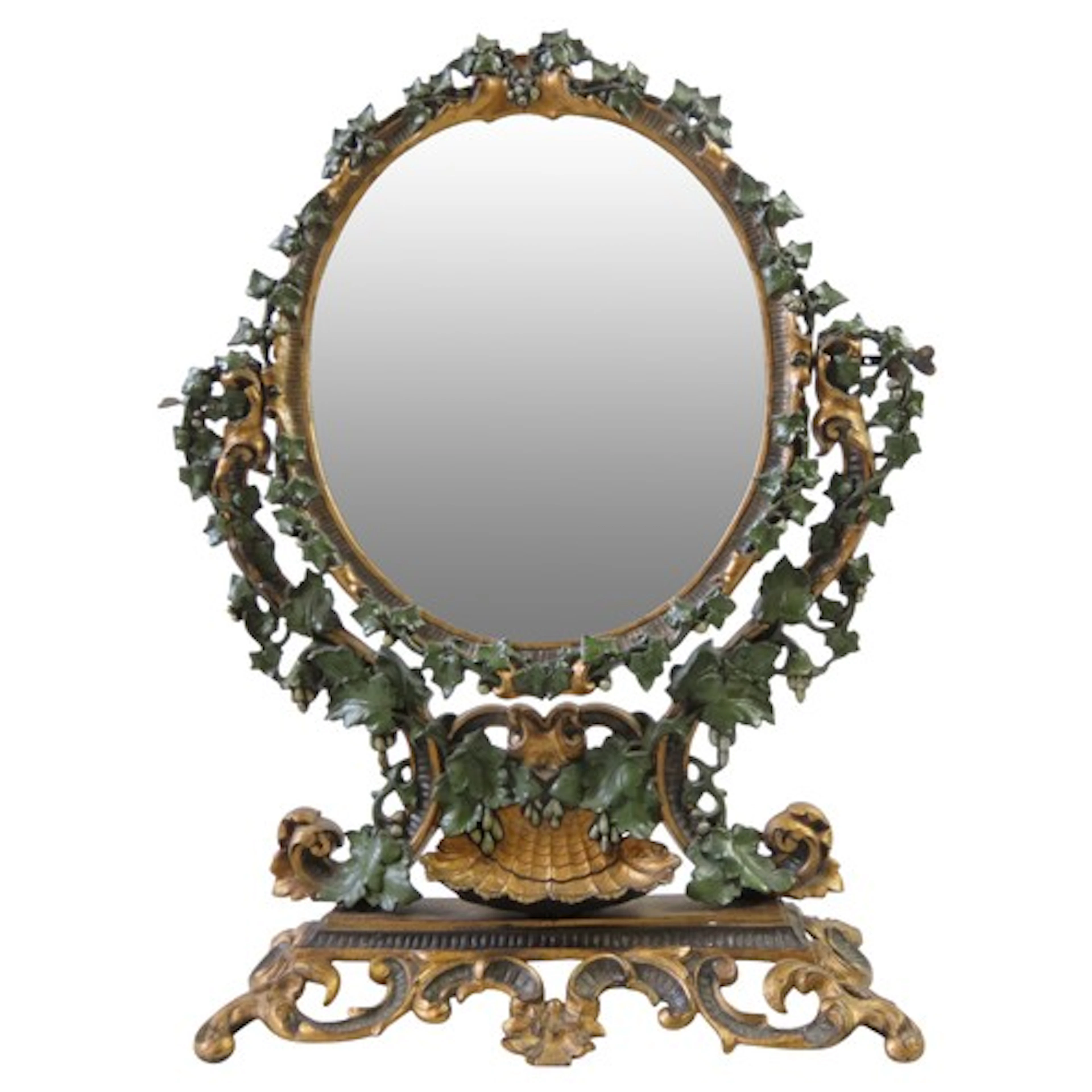 AN ORNATE VINTAGE CAST-IRON VANITY MIRROR LATE 19TH/EARLY 20...