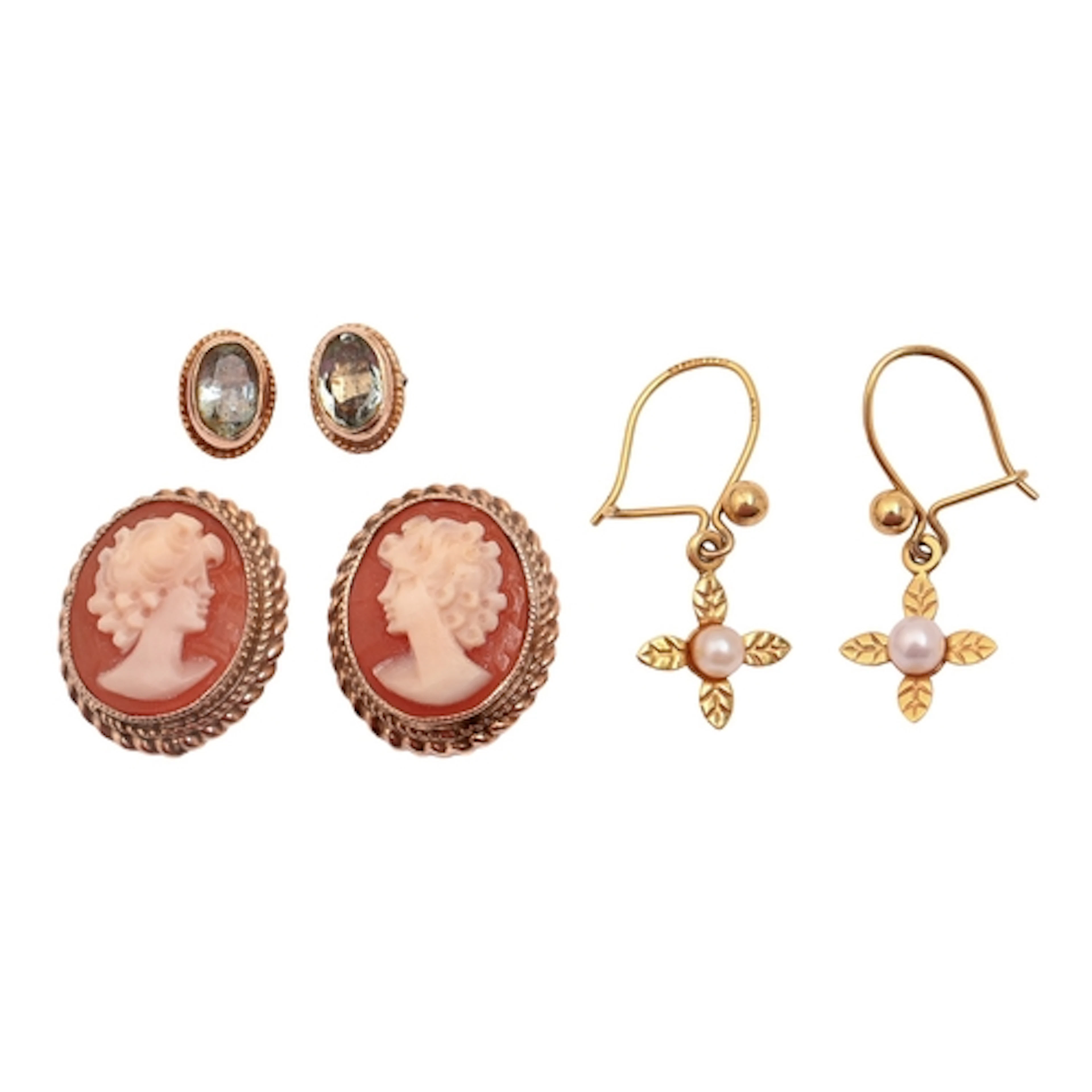 A pair of cameo earrings, in 9ct gold, the oval shell carved...