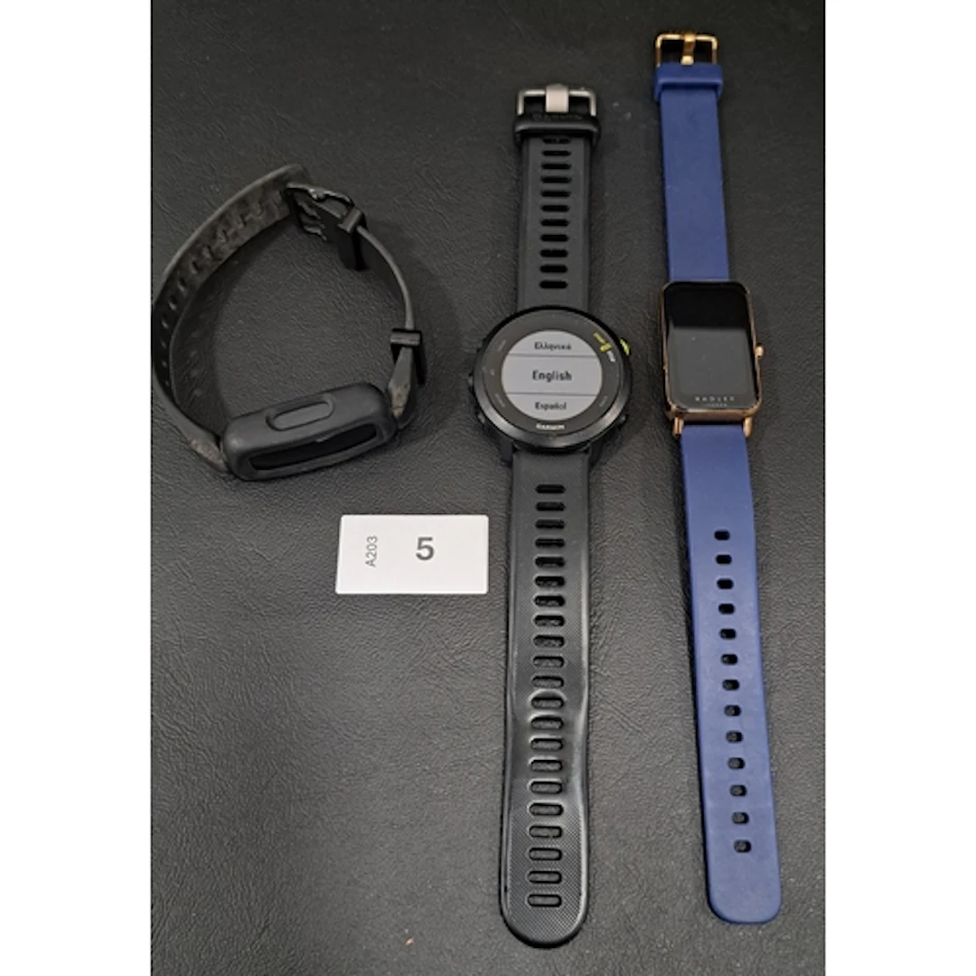 THREE FITNESS TRACKERS COMPRISING GARMNIN FORRUNNER 55, FITB...
