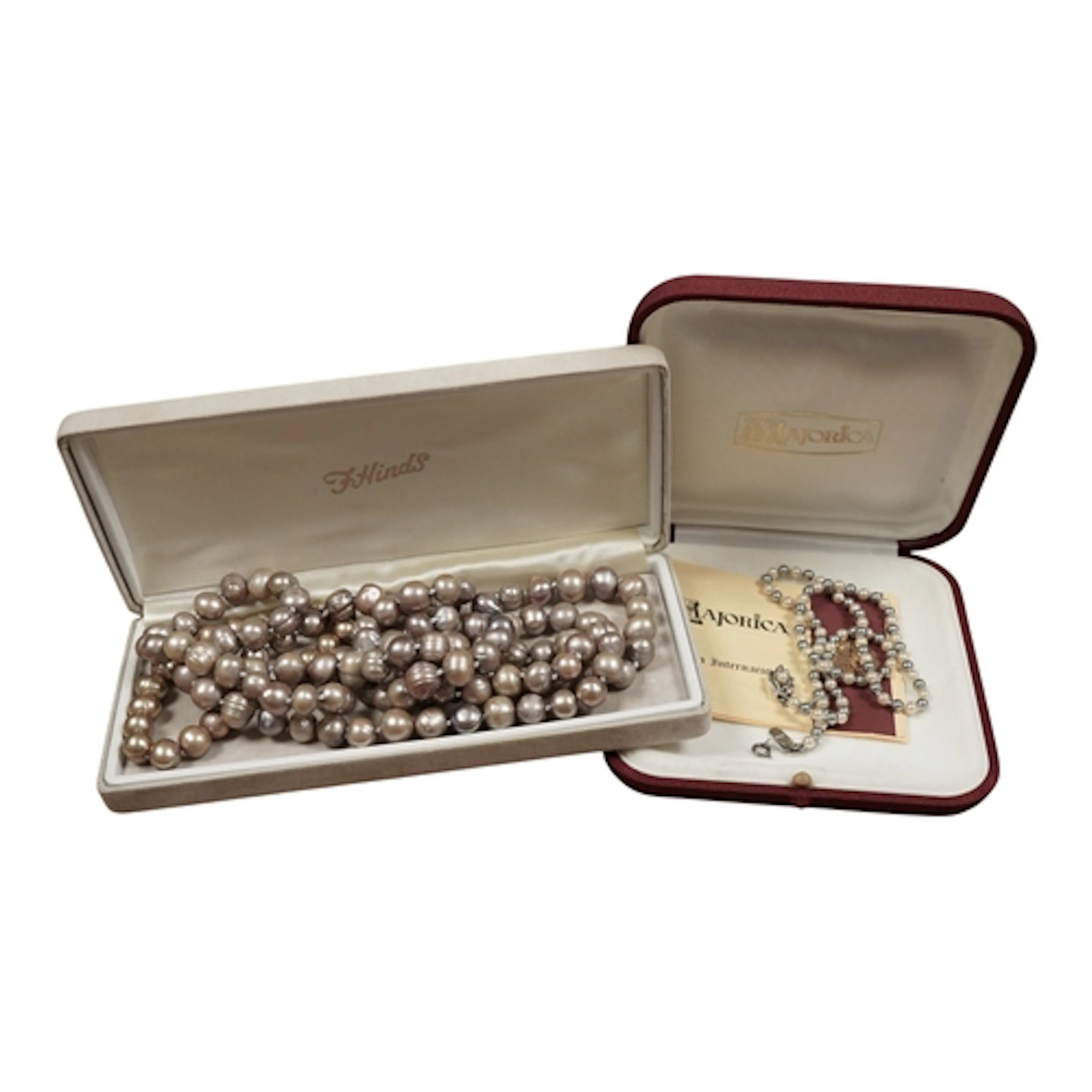 A singe strand baroque cultured pearl necklace, 118cm, a cul...